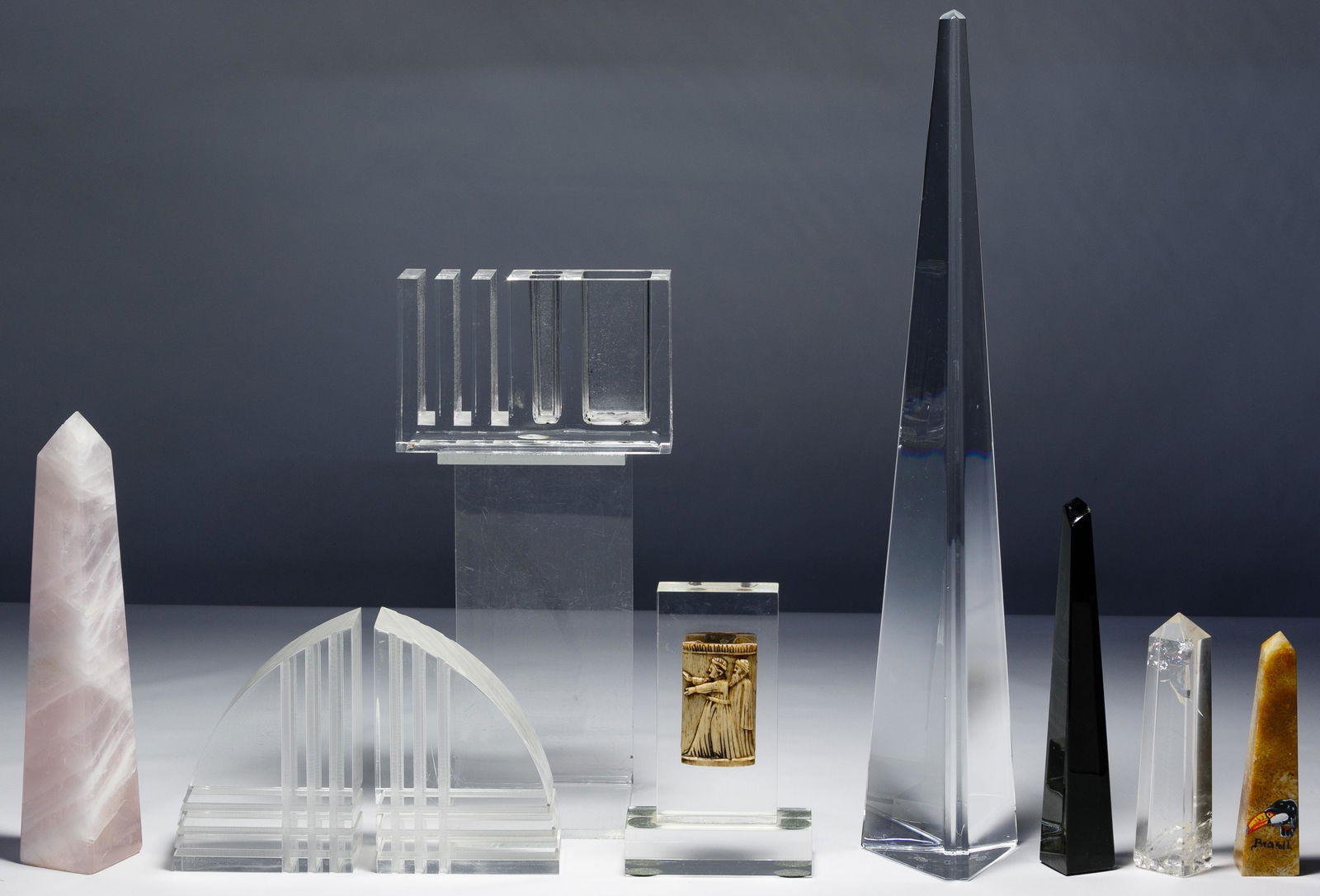 Obelisk and Lucite Desk Assortment: Obelisk and Lucite Desk Assortment Eight items including five obelisks comprised of Baccarat crystal and mirror marked on underside and at base, pink stone, light brown stone labeled 'Brazil' on front