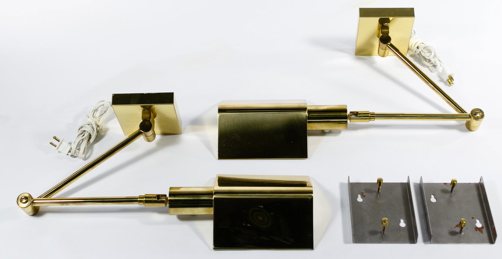 Koch and Lowy Articulated Brass Wall Lamps: Koch and Lowy Articulated Brass Wall Lamps Two items, dim-able, wall-mounted, swing arm; signed with impressed manufacturer mark to each lamp Condition: Very Good, minor wear, articulation functions p