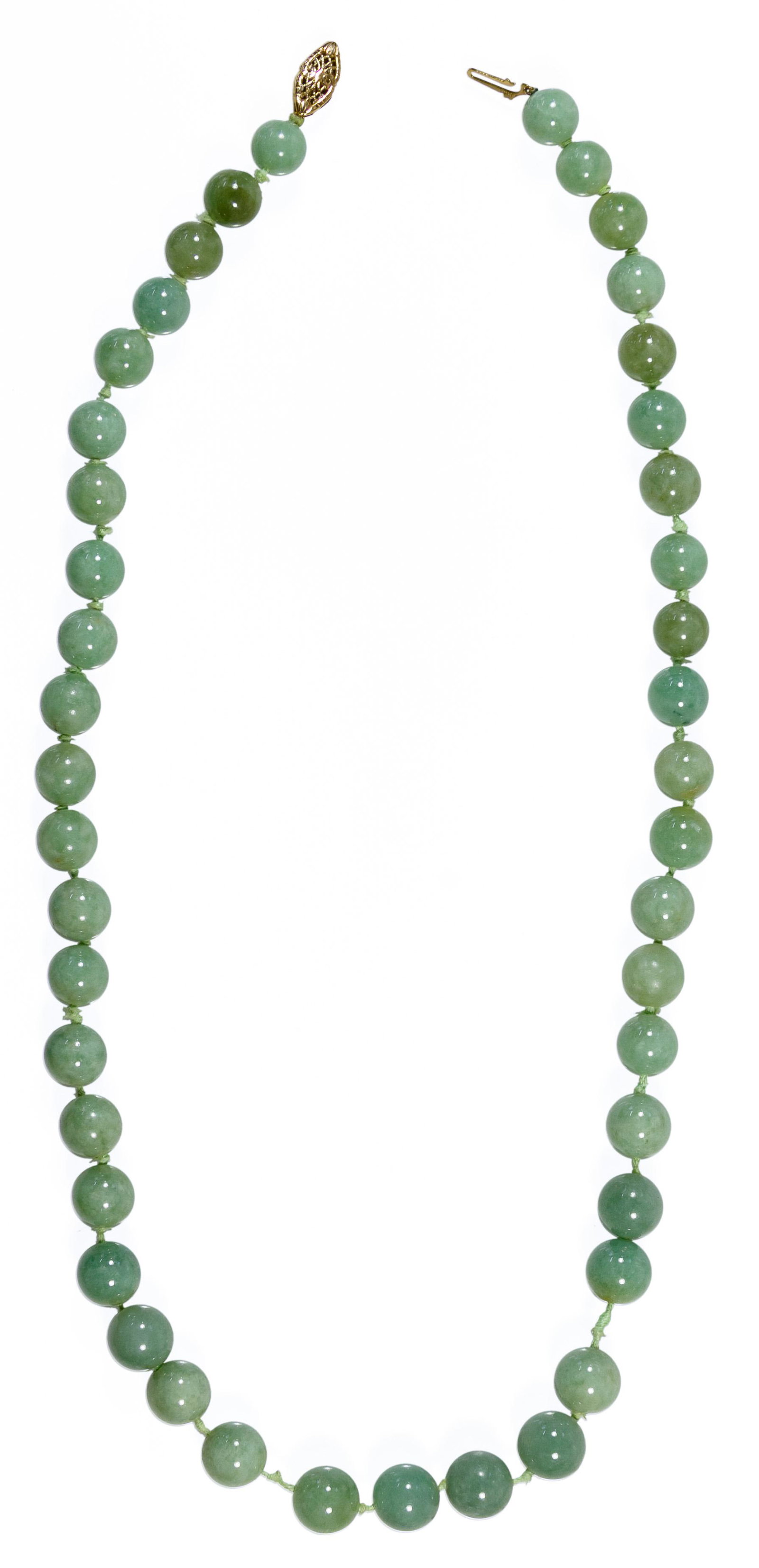 14k Gold and Jadeite Jade Necklace: 14k Gold and Jadeite Jade Necklace String of ball cut gemstones, knotted in between each, marked '14k' on clasp Condition: Very Good, overall light wear; gemstone(s) tested on the heat conductivity sc