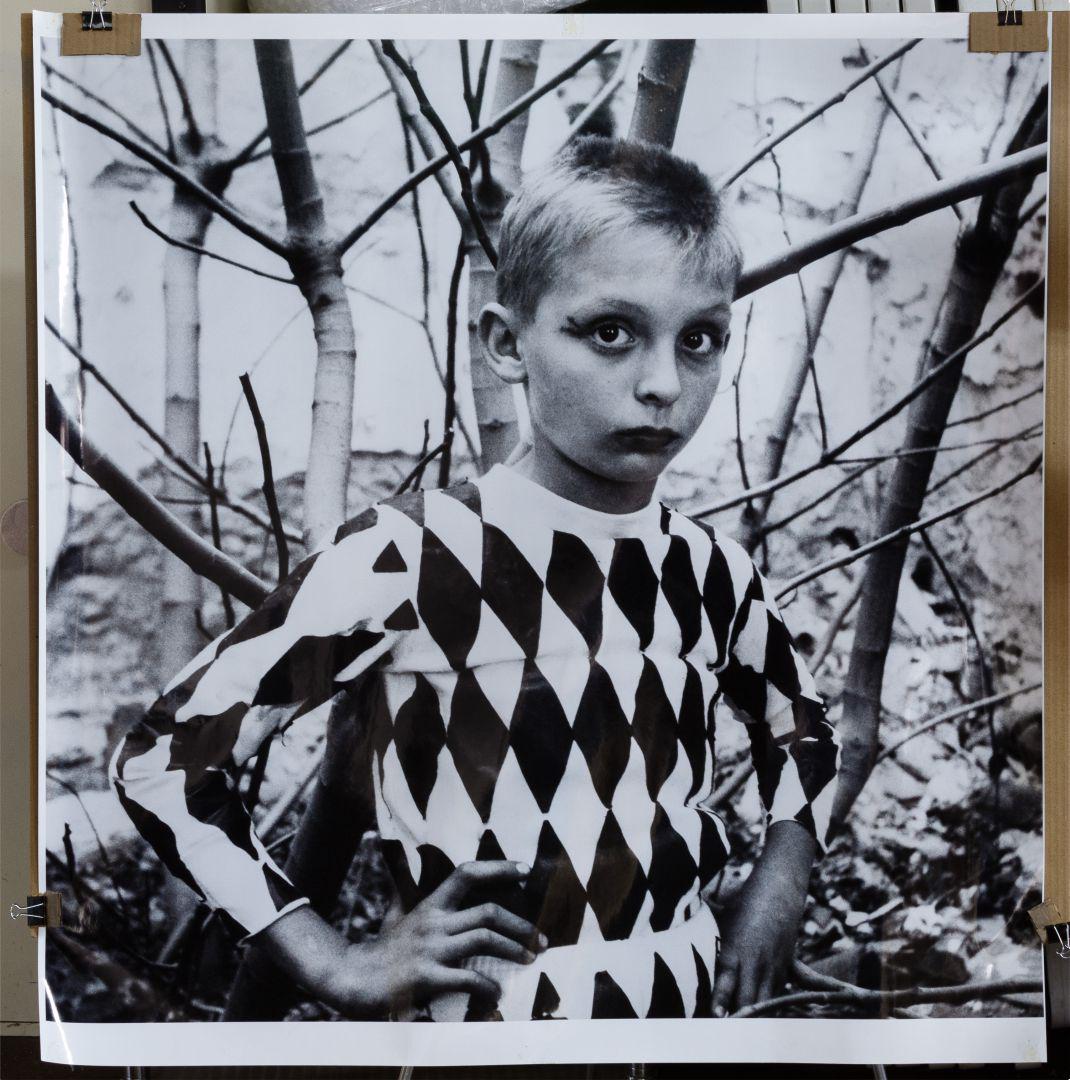 Lucien Clergue (French, 1934-2014) 'The Saltimbanque': Lucien Clergue (French, 1934-2014) 'The Saltimbanque' Photograph 1955, gelatin photograph enlargement of a young boy, from the series 'La Grande Recreation', Arles, France Condition: Very Good, two th