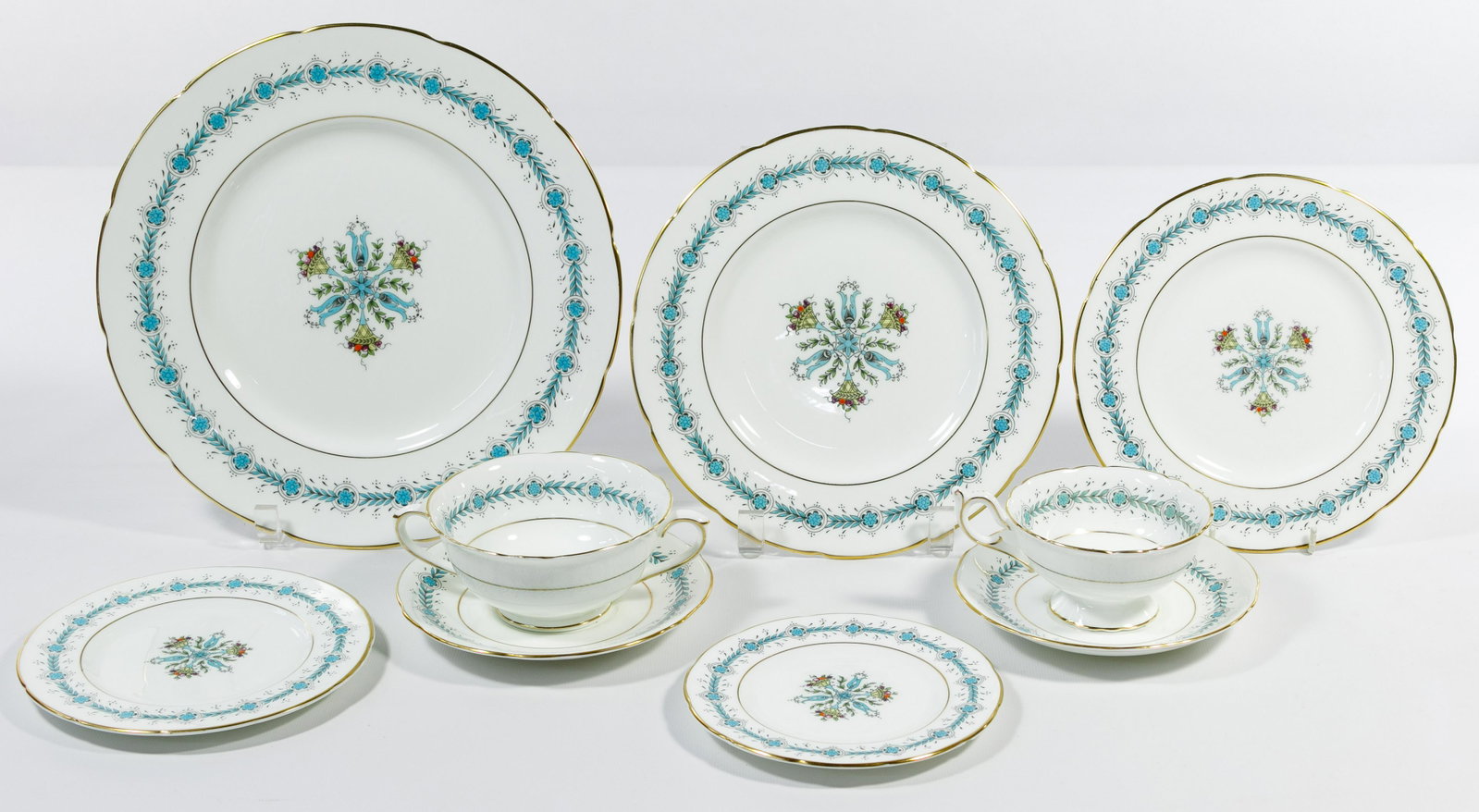Coalport 'Geneva' Dinner Service: Coalport 'Geneva' Dinner Service Including (13) dinner plates, (12) luncheon plates, (13) salad plates, (24) bread plates in two sizes, (12) handled soups, (12) teacups and (25) saucers Condition: Ver