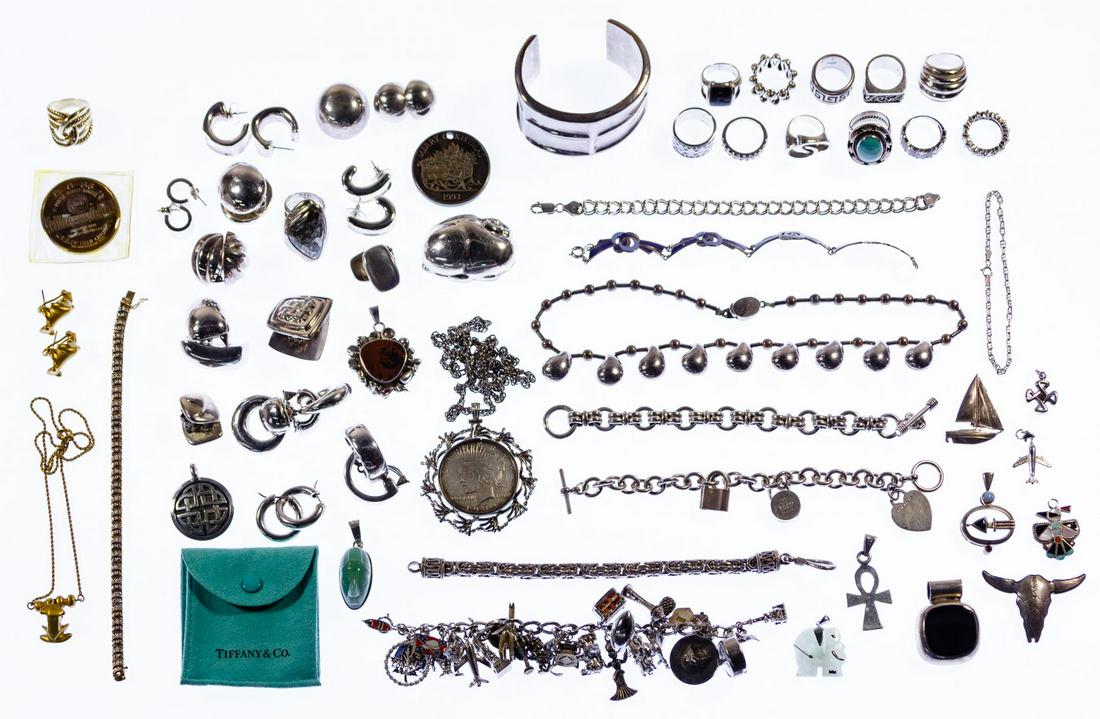 Sterling Silver Jewelry Assortment: Sterling Silver Jewelry Assortment Including earrings, pendants and bracelets; most marked 'sterling', '925' or 'fine' Condition: Very Good to Good, overall light wear; necklace and holder of silver d
