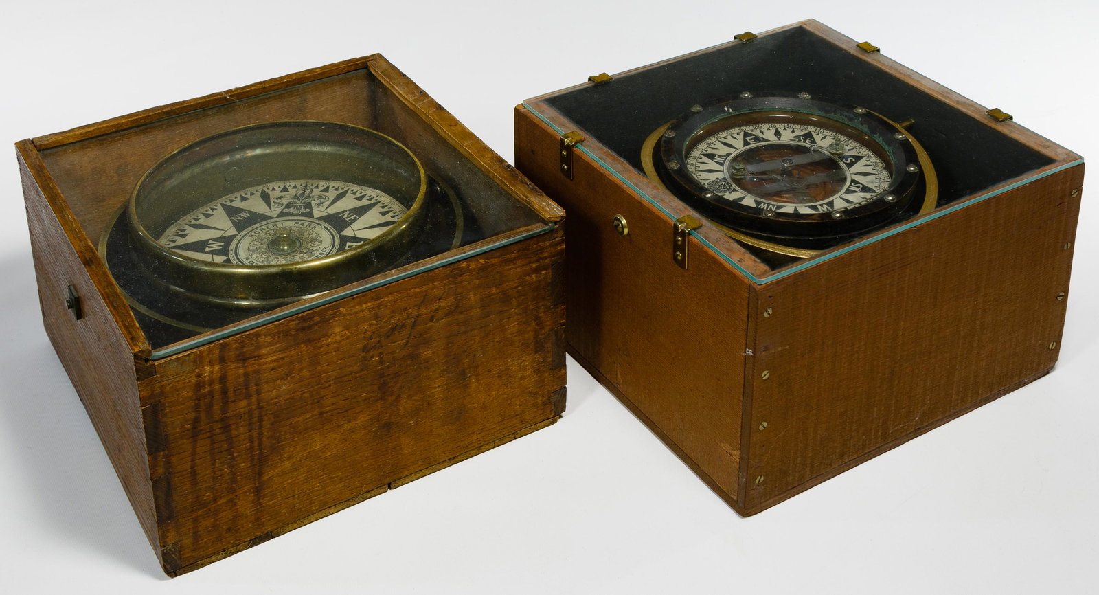 Nautical Compass Assortment: Nautical Compass Assortment Two compasses including a 'Metal Marine Pilot' by Wood Freeman and an example by Robert Park; both items housed in wood boxes Condition: Very Good to Good, light surface we