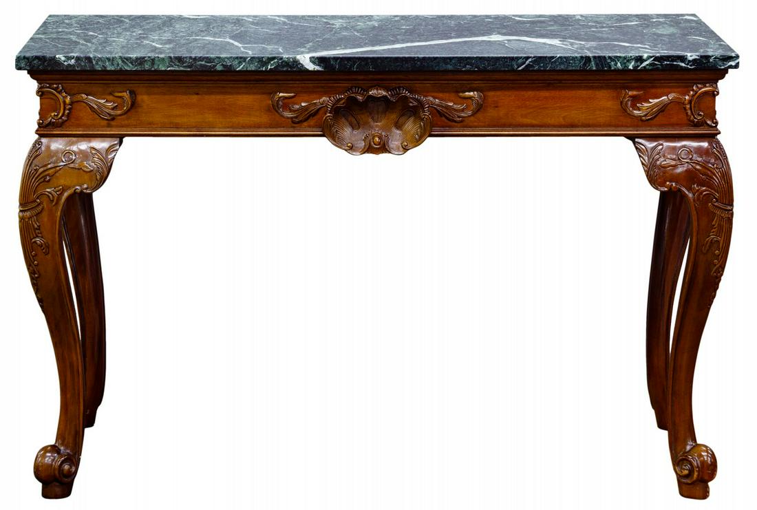 Marble Top Mahogany Console Table: Marble Top Mahogany Console Table Having a green marble top displaying black and white veining, scroll appliques on apron corners, a center shell applique on apron front and carved wood legs having sc