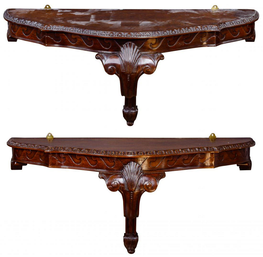 Mahogany Demilune Wall Mounted Console Tables: Mahogany Demilune Wall Mounted Console Tables Carved skirt having wave design; labeled 'Made in Philippines' Condition: Very Good, overall light wear consistent with age and normal use Height: 18 inch