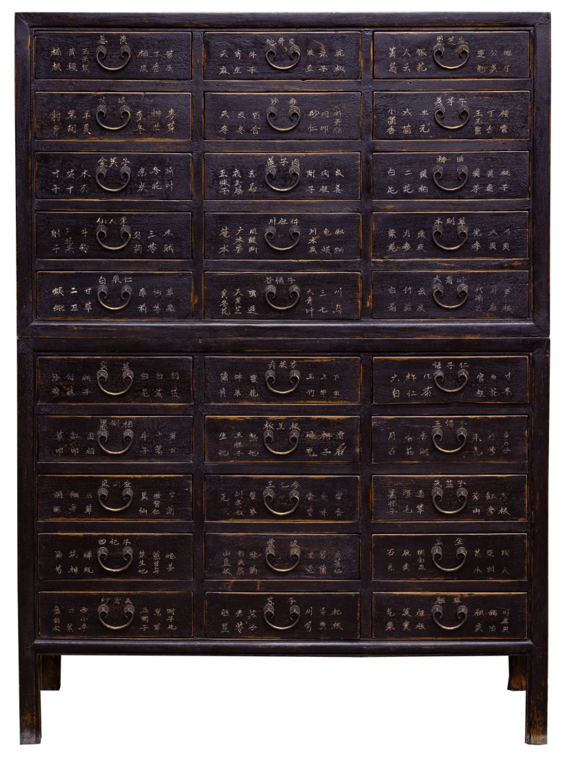Asian Style Elm Apothecary Cabinet: Asian Style Elm Apothecary Cabinet Two pieces having dovetail construction, thirty drawers, black painted distressed surface, metal hardware and decorated with Asian characters; dealer tag attributes 