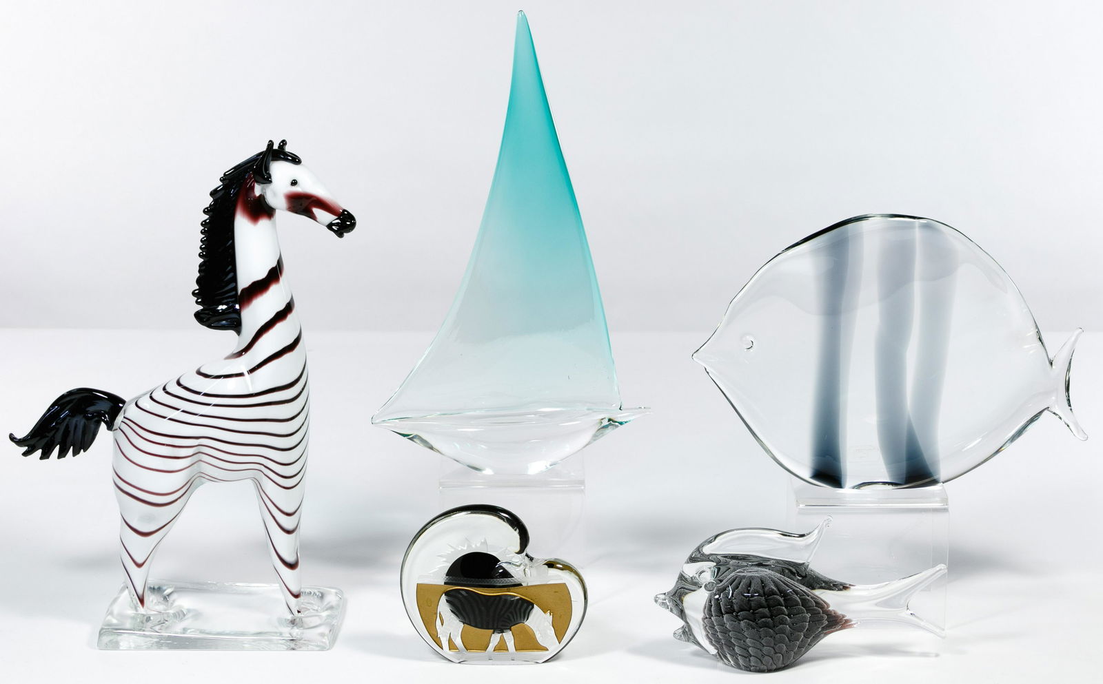 Art Glass Assortment: Art Glass Assortment Five items including FH Ronneby Sweden fish, Oggetti Italy fish, Oggetti Italy sailboat, Formia Murano zebra #4/500; and perfume holder with zebra motif marked 'S.I.N, 3623'; all