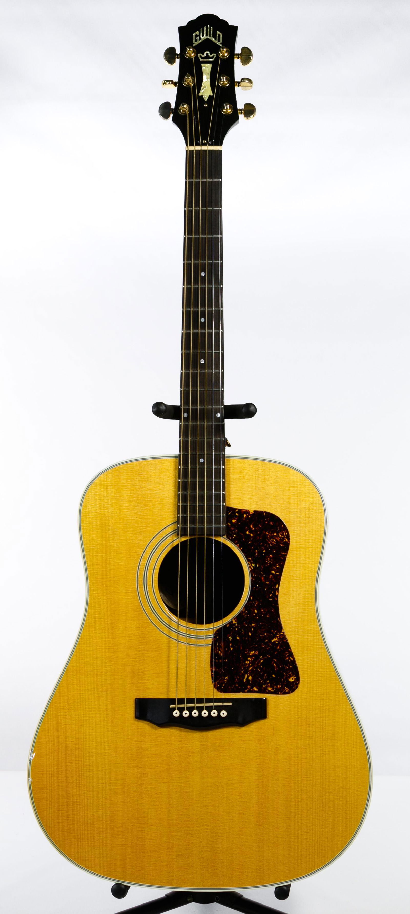 1991 Guild D-50NT Acoustic Guitar with Case: 1991 Guild D-50NT Acoustic Guitar with Case Serial #D500771, six string, Dreadnought, natural spruce with rosewood back and sides, mother of pearl inlay, ebony fret board, with hard case Condition: Ve