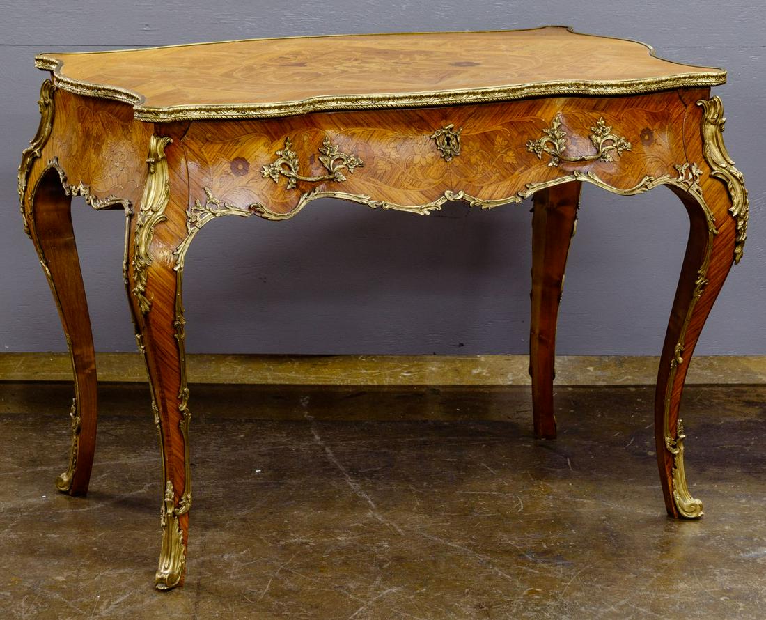 Mahogany and Satinwood Dressing Table / Desk: Mahogany and Satinwood Dressing Table / Desk Having mahogany veneer with satinwood inlay; top slides back to reveal single drawer with compartments and flip up stand Condition: Fair, overall heavy wea