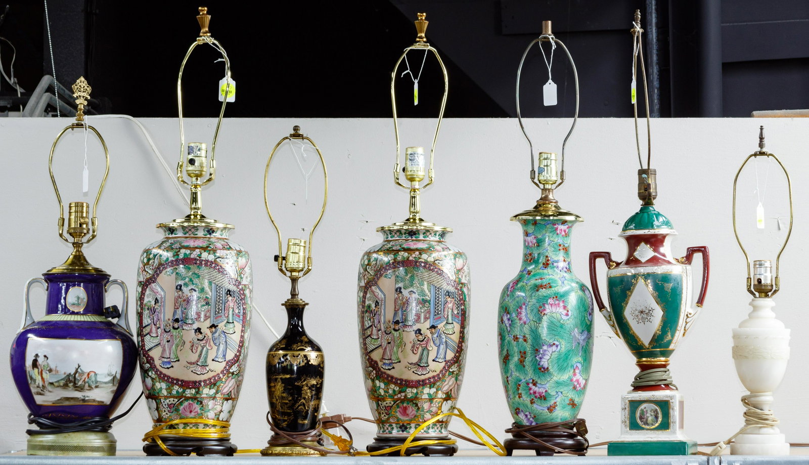Ceramic Lamp Assortment: Ceramic Lamp Assortment Seven lamps including four Asian themed vase style with a matching pair and two individual; two urn style, one depicting a European seaside and one depicting Grecian women and 
