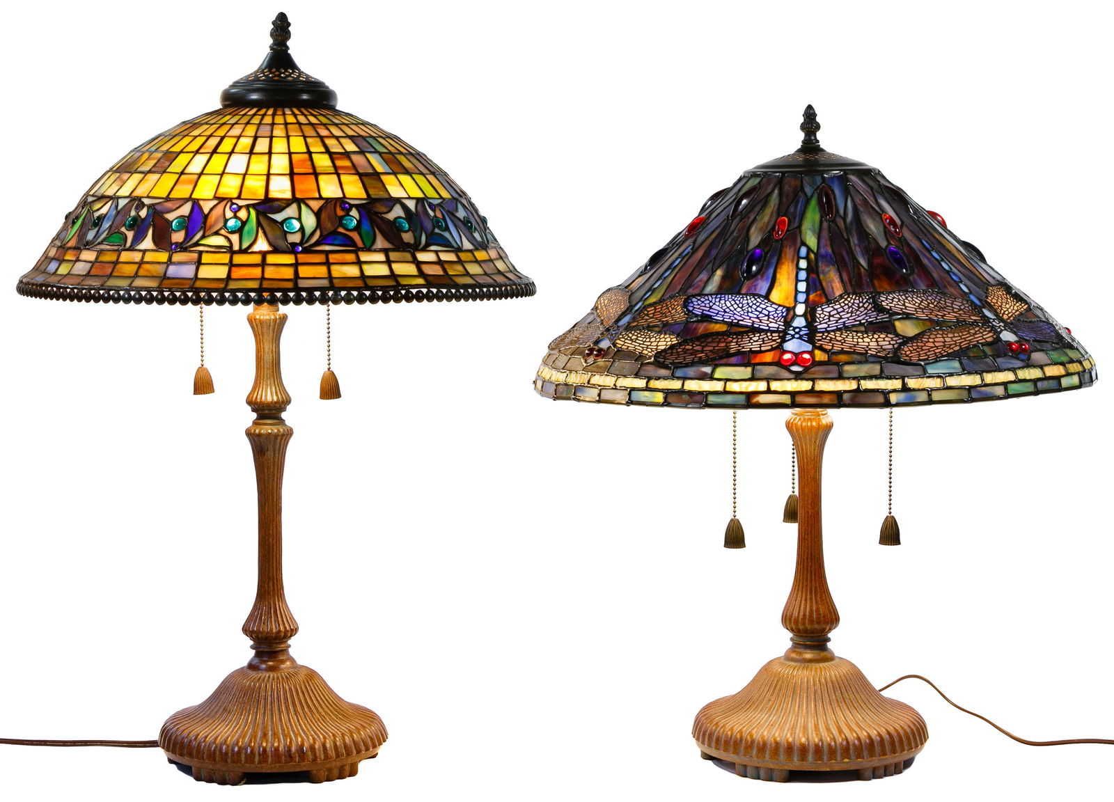 Tiffany Style Table Lamps: Tiffany Style Table Lamps Two items including a dragonfly motif having triple pull chain; a checkerboard and floral band motif having double pull chain; both having a copper colored metal bases Condit