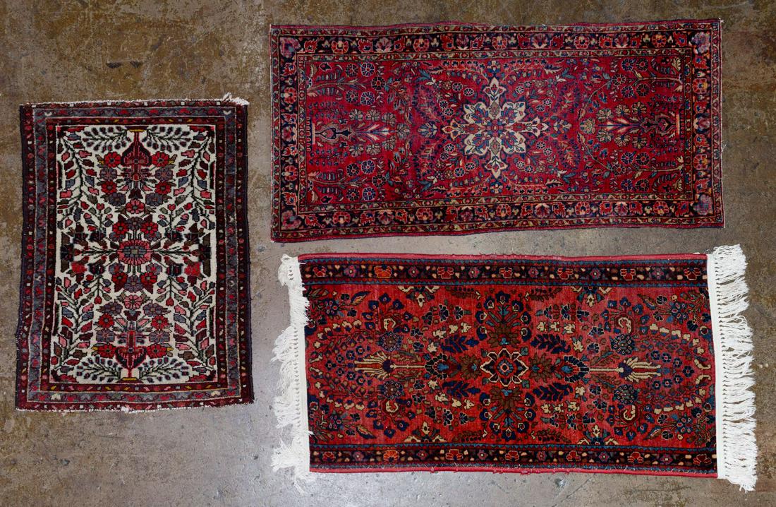 Area Rug Assortment: Area Rug Assortment Three area rugs, having tones of red and a floral motif Condition: Good to Fair, overall moderate wear consistent with age and normal use; all rugs showing wear to field; two havin