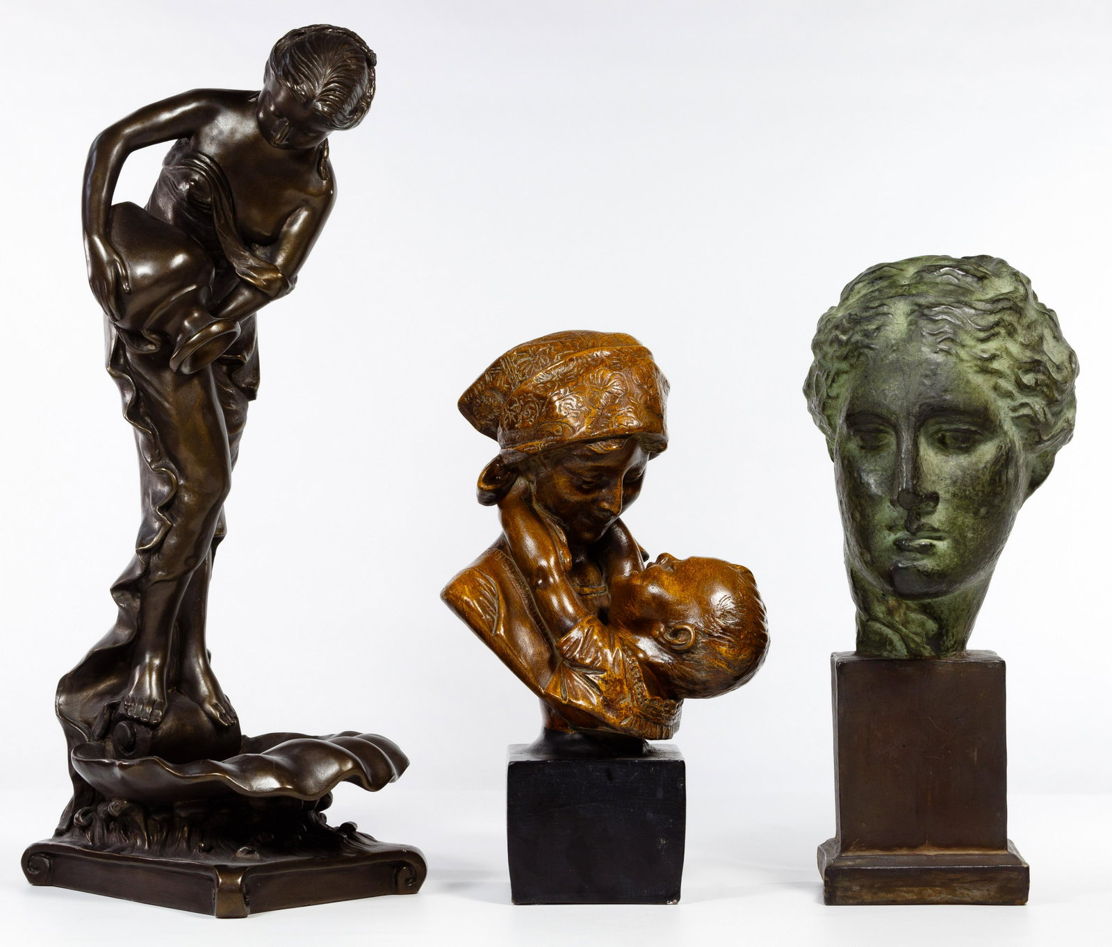 Composition Statue Assortment: Composition Statue Assortment Three items including a Greek style female bust, a Greek style female water bearer and a mother and child Condition: Very Good, minor chips to finish on water bearer and 