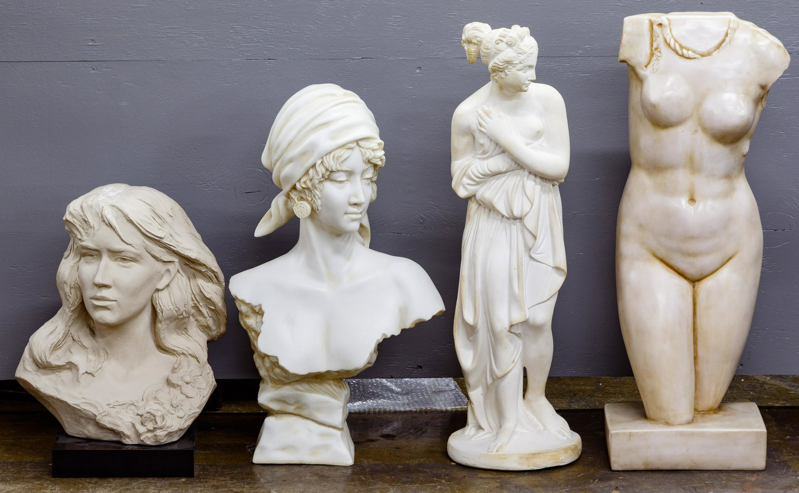 Female Art Statue Assortment: Female Art Statue Assortment Four contemporary cast items including a plaster Grecian woman, a plaster and painted female bust having a black laminate base, a ceramic nude torso marked 'Alva Museum Re