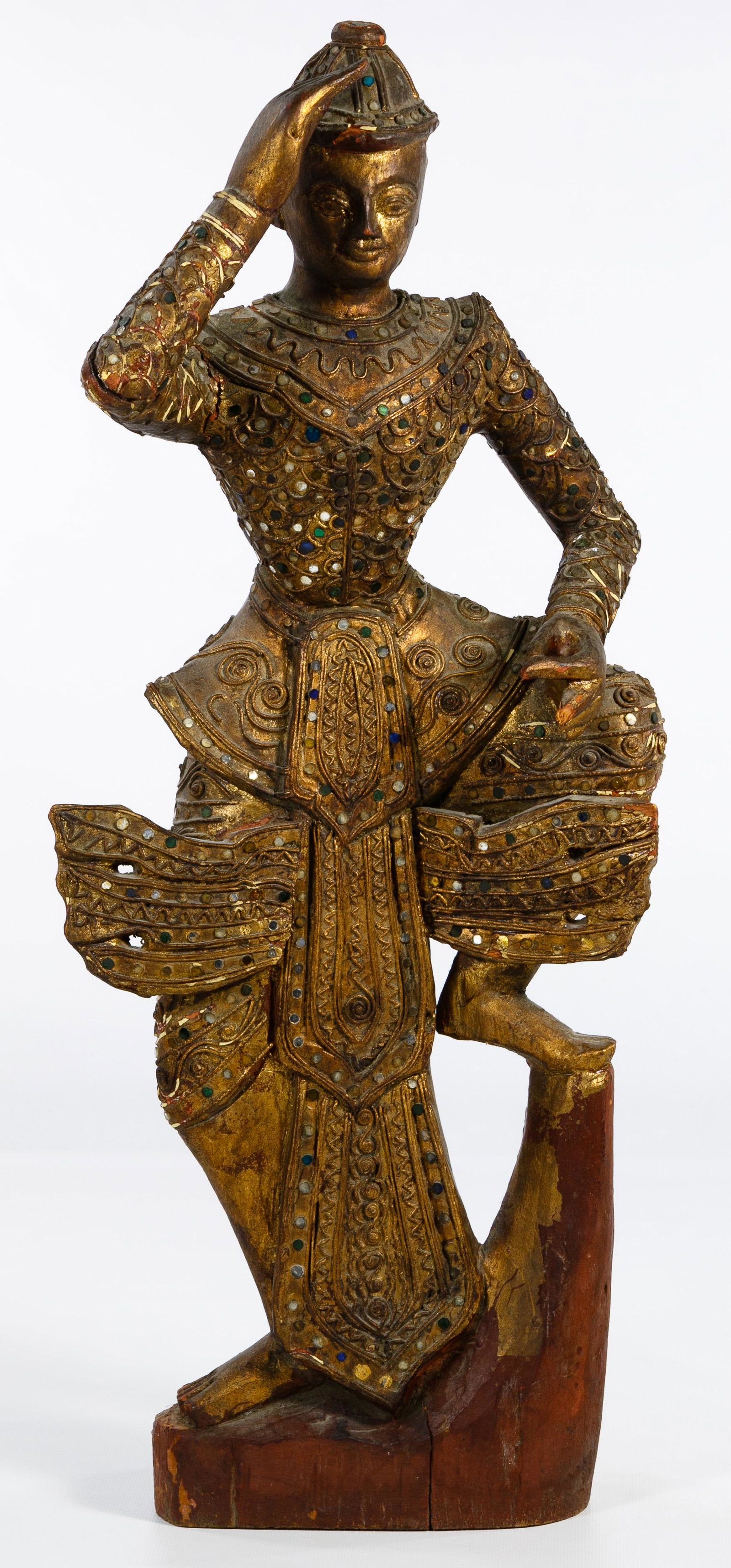 Thai Gilt Wood Sculpture: Thai Gilt Wood Sculpture 20th century Rattanakosin style, gilt over lacquered wood carving of a dancer having multicolored mirror inlays Condition: Very Good, raised arm split at elbow; stable splits 