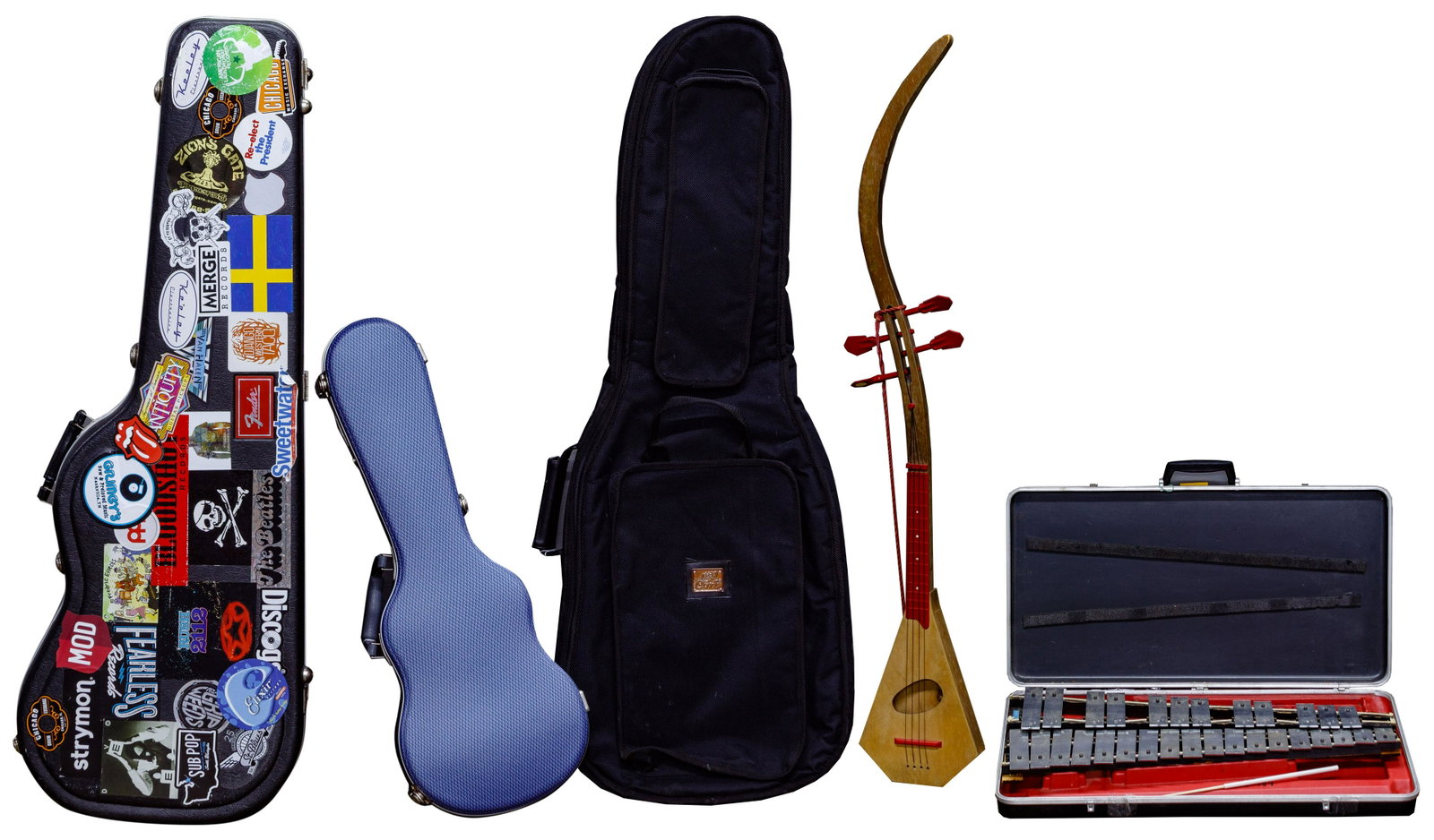 Guitar Case and Musical Instrument Assortment: Guitar Case and Musical Instrument Assortment Five items including a Musser-Kitching xylophone with mallets and case, a Polk A Lay Lee as well as a guitar hard case, a ukulele hard case and a soft cas
