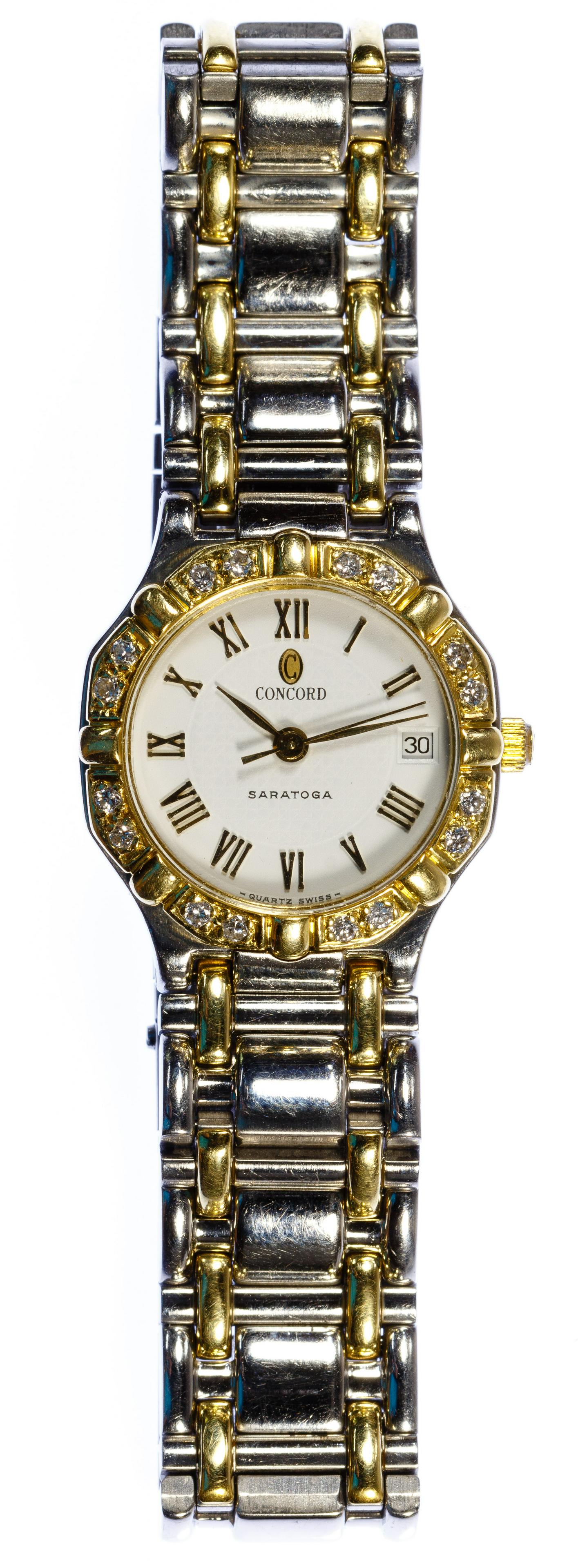 Concord 'Saratoga' 18k Gold, Stainless Steel and: Concord 'Saratoga' 18k Gold, Stainless Steel and Diamond Wrist Watch Reference #15 73 287 / 1, serial #798420 having an 18k gold bezel adorned with small round cut diamonds on a stainless steel case m
