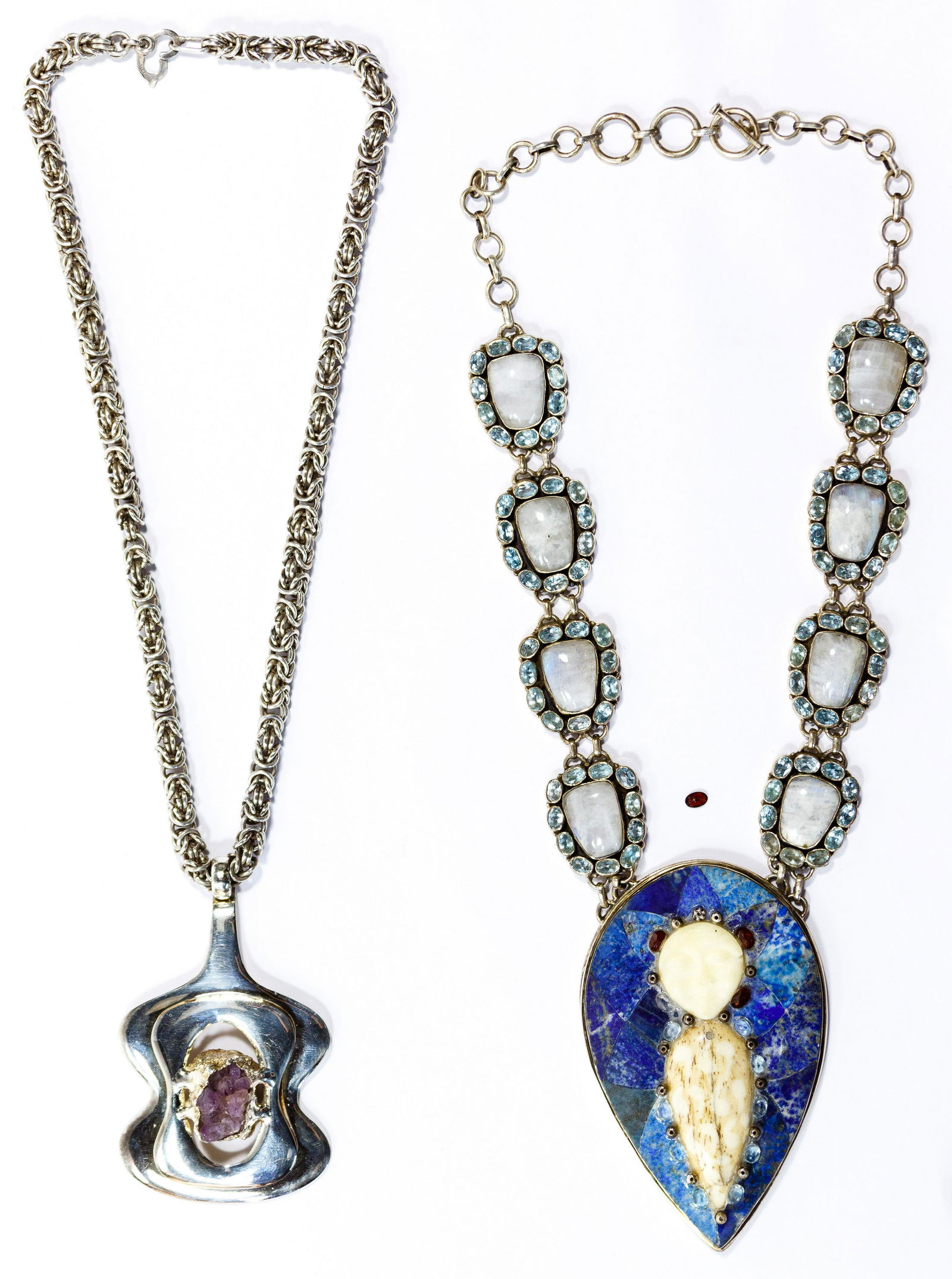 Jacob Hull and India Sterling Silver Necklaces: Jacob Hull and India Sterling Silver Necklaces Two items including a geode-style amethyst pendant marked 'Jacob Hull' and 'Denmark' having a byzantine link chain marked 'sterling' on clasp as well as