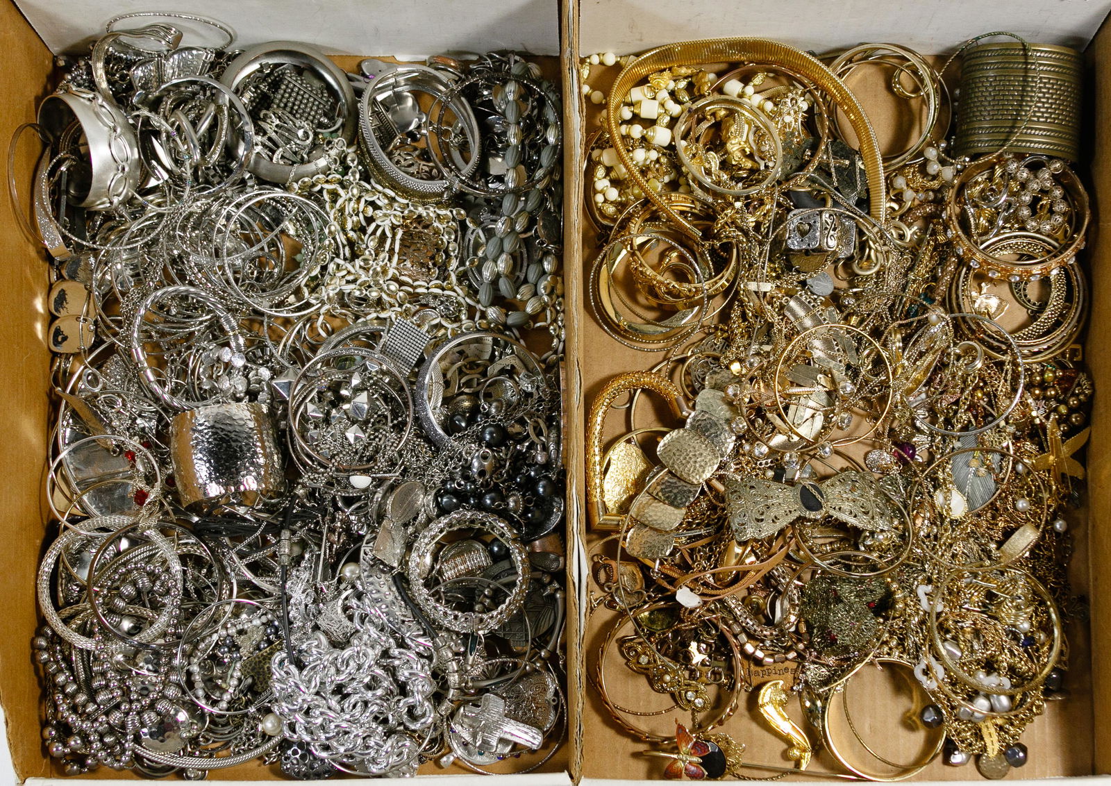 Gold-tone and Silver-tone Costume Jewelry Assortment: Gold-tone and Silver-tone Costume Jewelry Assortment Over fifteen pounds of costume jewelry including necklaces, bracelets, cuffs, earrings and pendants Condition: Very Good to Fair, overall light to