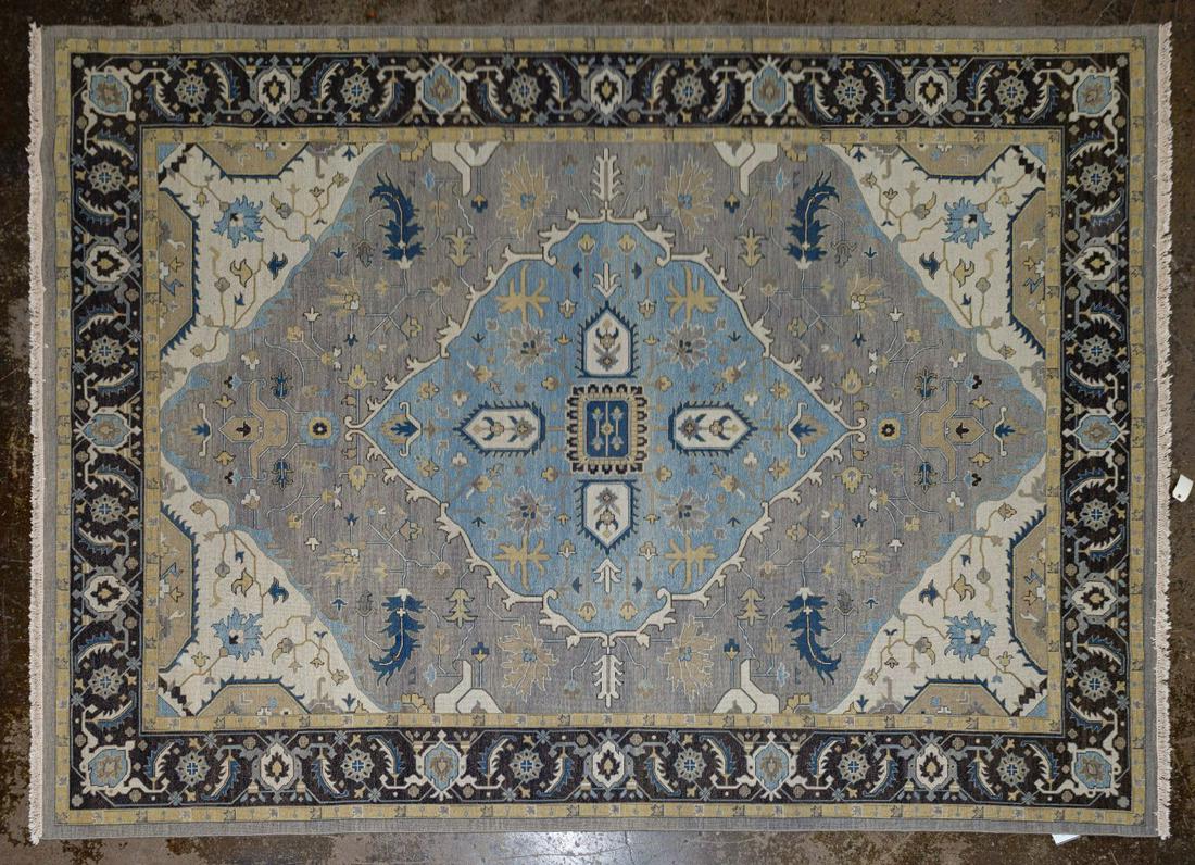 Goshen Wool Area Rug: Goshen Wool Area Rug Hues of grey, and light blue; tag on back side Condition: Very Good, light wear consistent with age and wear Length: 162 inches, Width: 114 inches (without fringe) Category: Decor