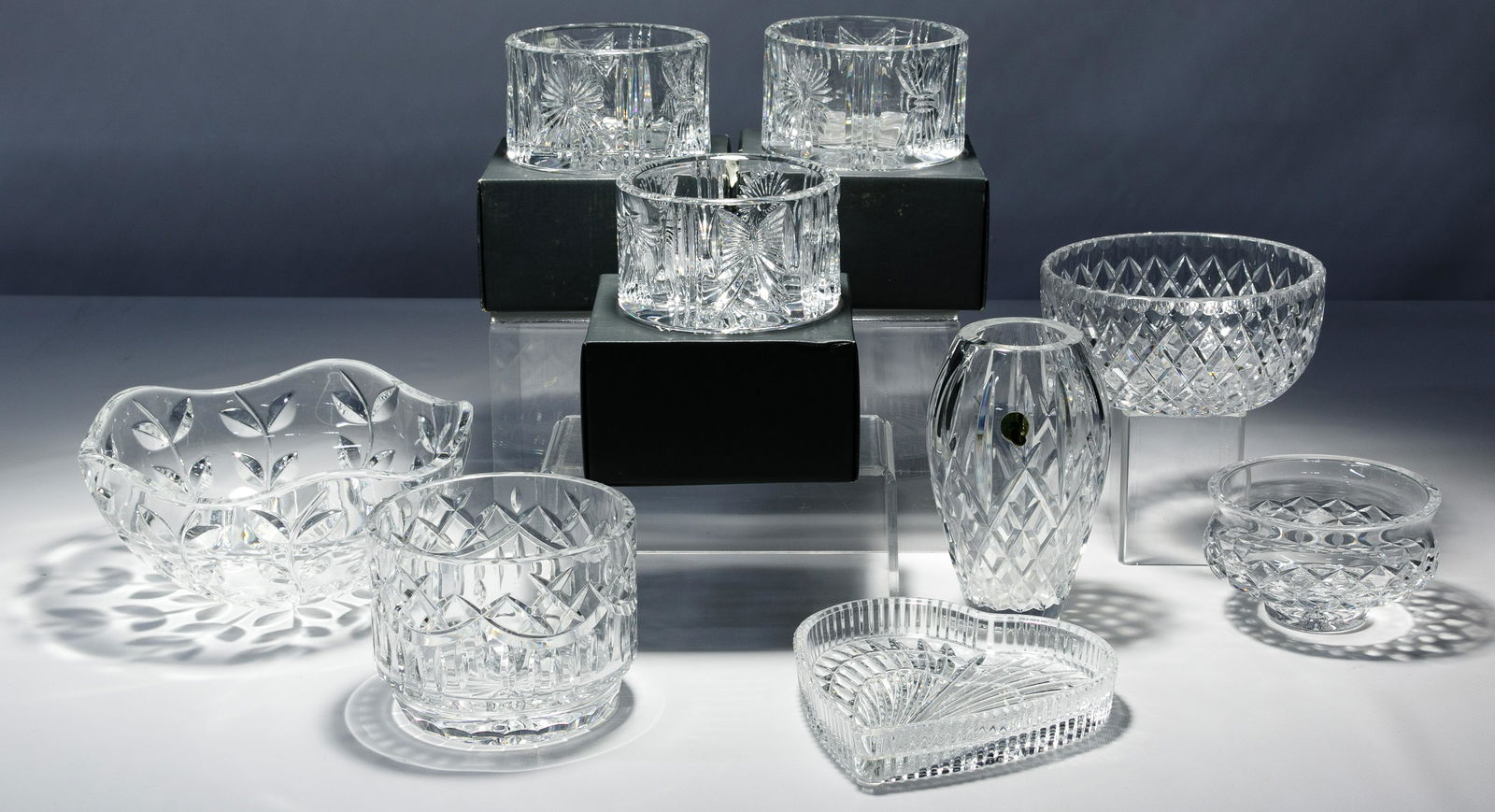 Waterford and Crystal Assortment: Waterford and Crystal Assortment Nine items including Waterford heart shaped tray, three millennium champagne bottle coasters, footed bowl, diamond pattern vase, Tiffany 'Lydia' pattern bowl, Ceska 'C