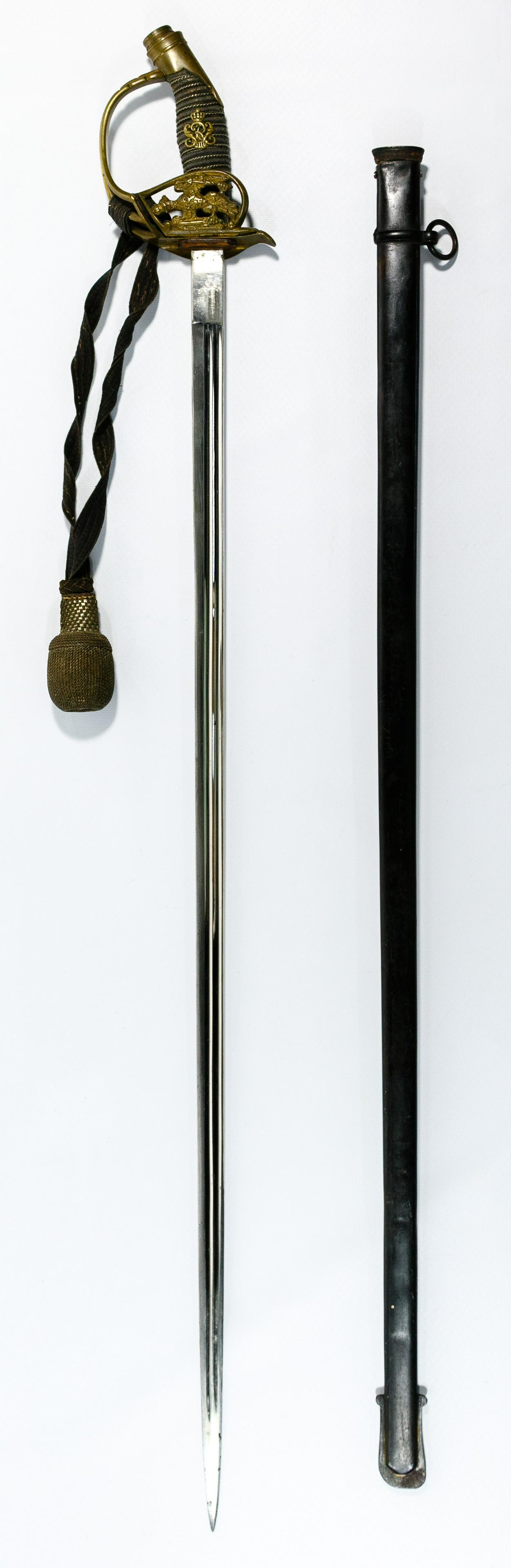 World War I German Sword and Scabbard: World War I German Sword and Scabbard Imperial Prussian M 1889 Infantry officer sword having double fullered straight steel spear point blade, brass guard with crowned Prussian eagle, wire wrapped sha