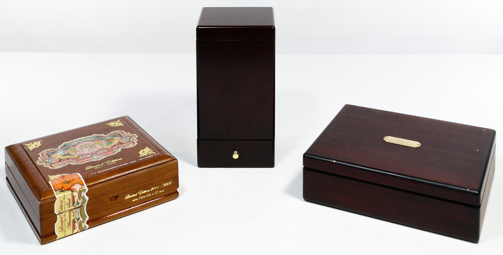 Humidor Assortment: Humidor Assortment Three items including a tall wood humidor having a drawer for cigar accessories, a box humidor having a gauge and cigar cutters inside and a 'My Father' limited edition 2011 cigar b