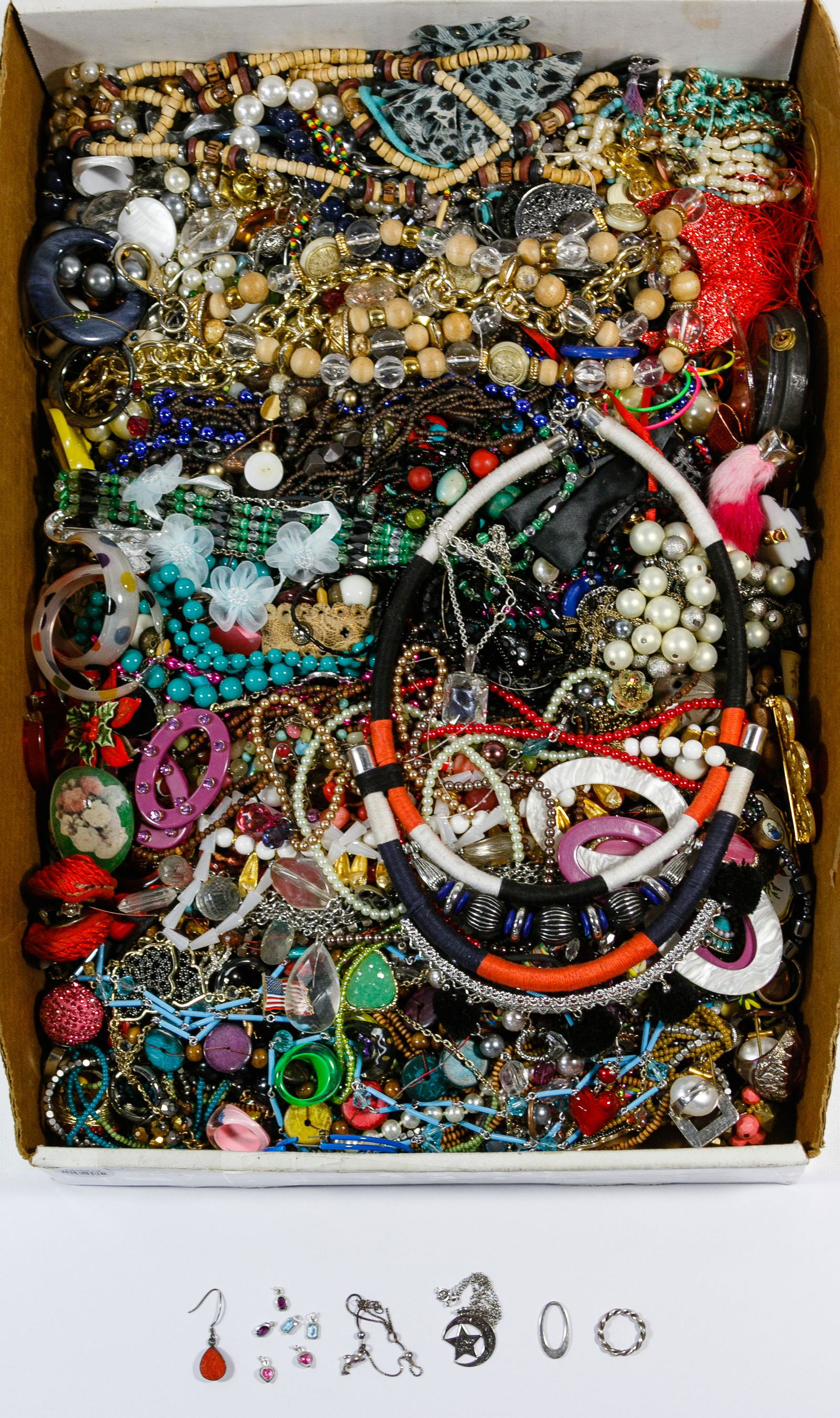 Sterling Silver and Costume Jewelry Assortment: Sterling Silver and Costume Jewelry Assortment Over fourteen pounds of necklaces, earrings, bracelets, bangles, rings and pins; many beaded; some silver marked '925' or 'sterling' Condition: Very Good