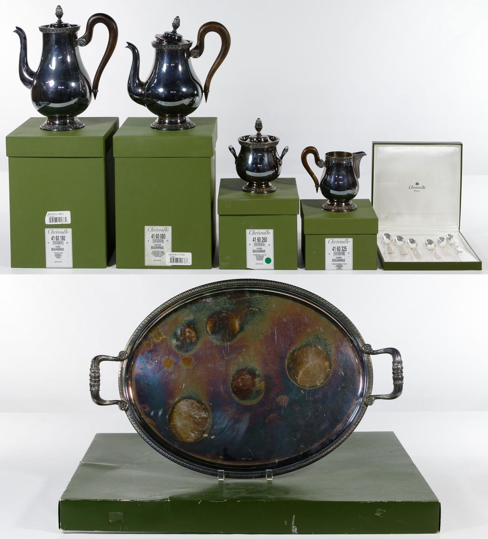 Christofle Silverplate 'Beauharnais' Coffee and Tea: Christofle Silverplate 'Beauharnais' Coffee and Tea Service Including coffee pot, teapot, creamer, sugar bowl, a set of six coffee spoons and a service tray; all having original boxes Condition: Very