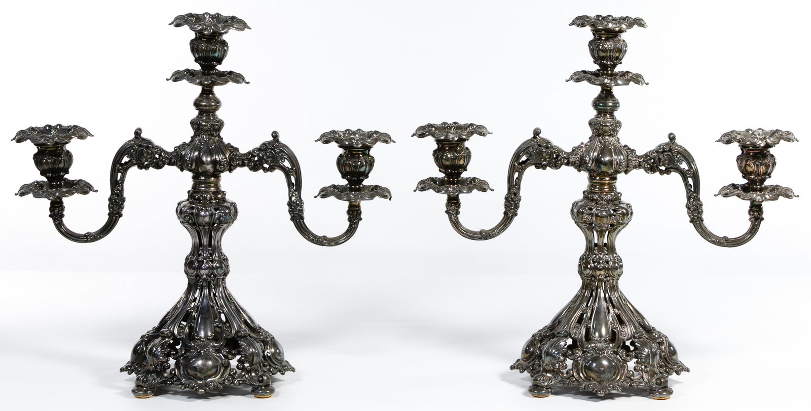 Reed & Barton 'Renaissance' Silverplate Candelabras: Reed & Barton 'Renaissance' Silverplate Candelabras Pair, elaborate openwork, footed, triple sconce, marked on inside of base Condition: Very Good, light wear, heavy tarnish, some wax residue Height: 