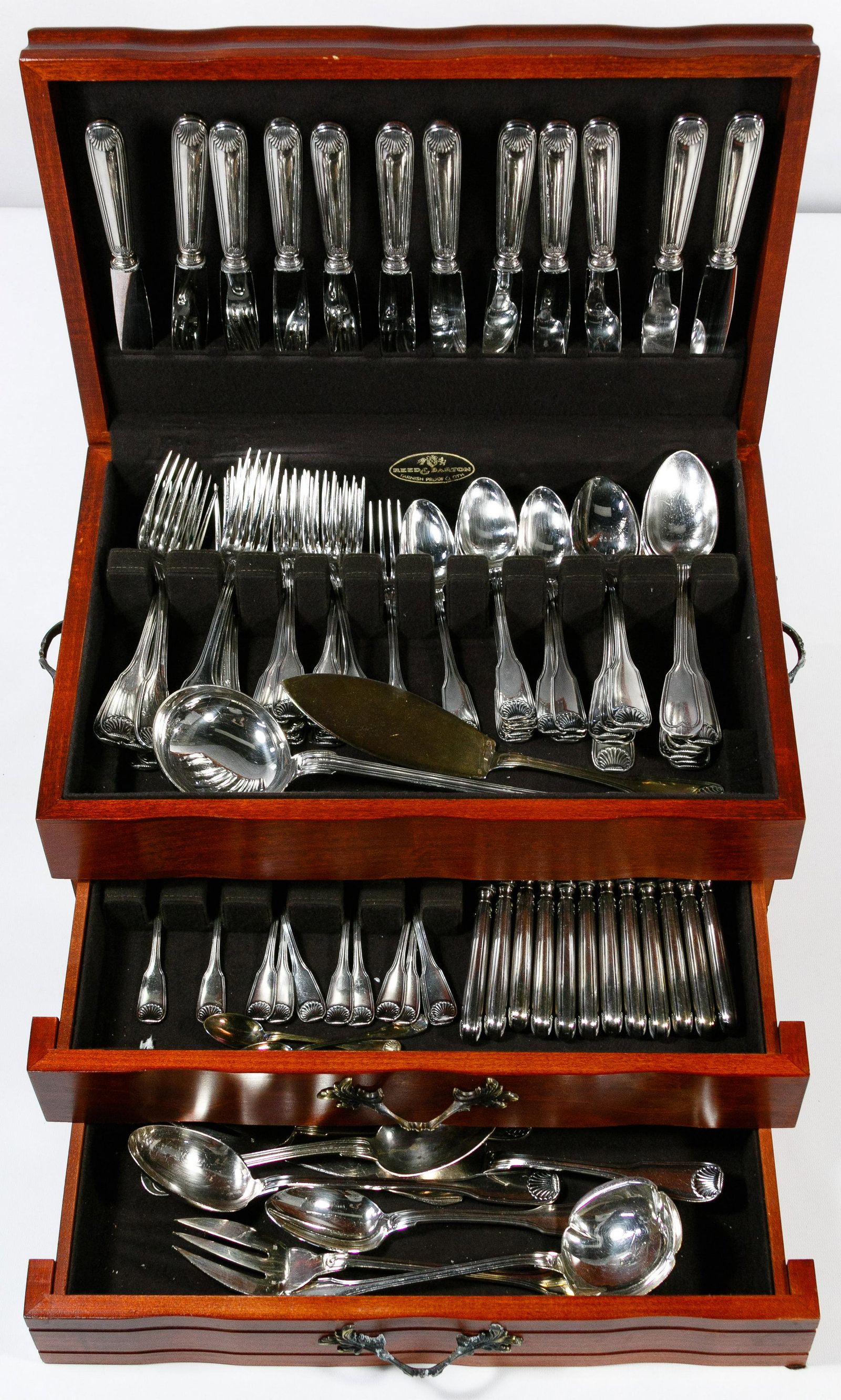 Felix Freres Toulouse Silverplate Flatware: Felix Freres Toulouse Silverplate Flatware Near complete service for twelve having a shell pattern and including (12) dinner forks, (13) salad forks, (11) luncheon forks, (12) cocktail forks, (12) tab