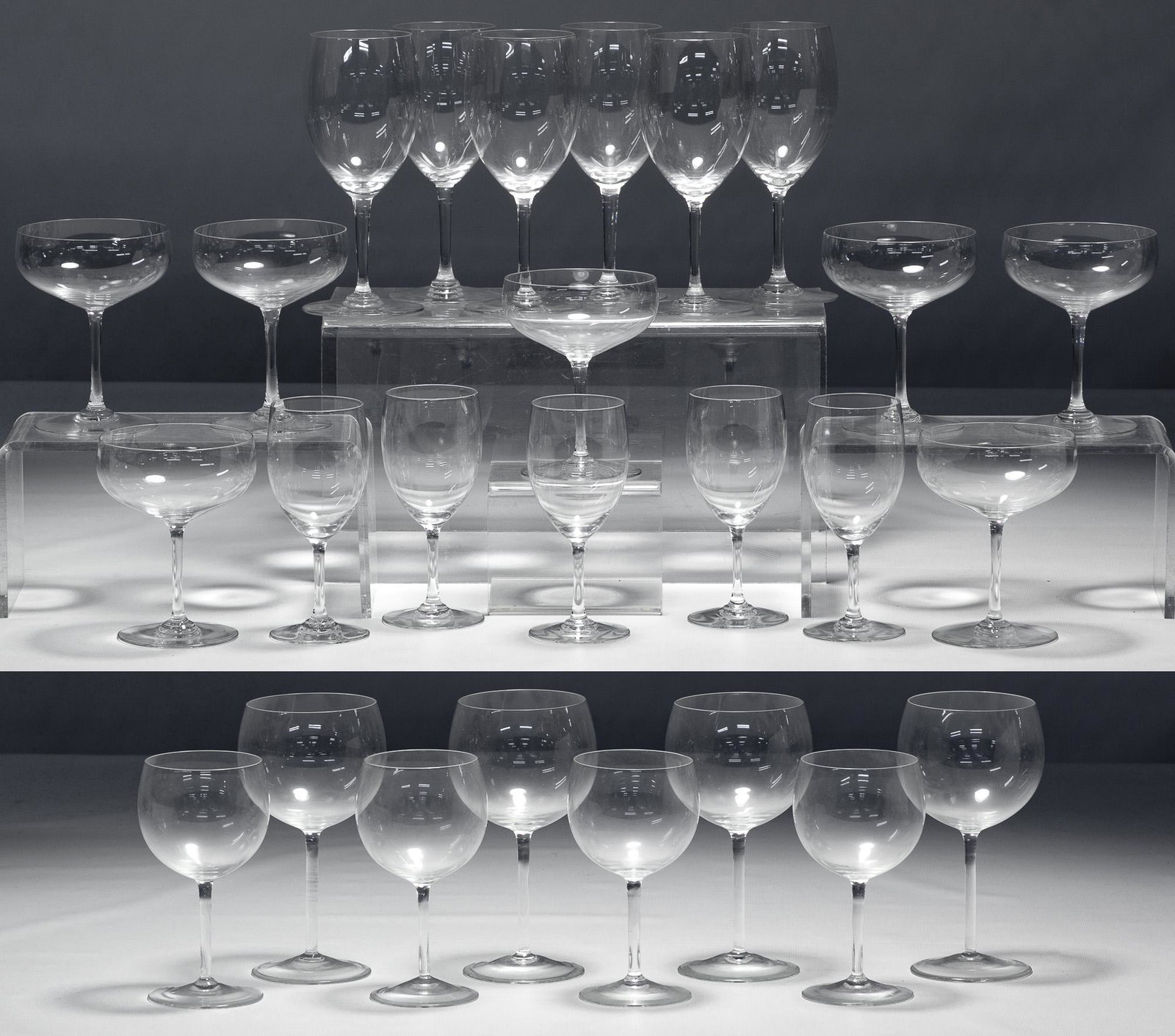 Baccarat Crystal: Baccarat Crystal 'Perfection' Glass Collection Including (5) port, (7) champagne, (6) wine, all marked on underside; together with eight unmarked wine glasses Condition: Very Good to Good, light wear,