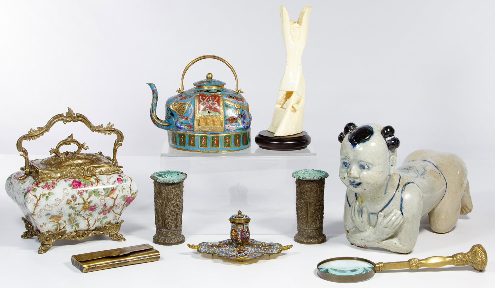 Asian Decorative Object Assortment: Asian Decorative Object Assortment Nine items including a painted enamel ink well, cloisonne elephant teapot, brass eyeglass case, brass magnifying glass, resin statue, two brass vases, ceramic and br