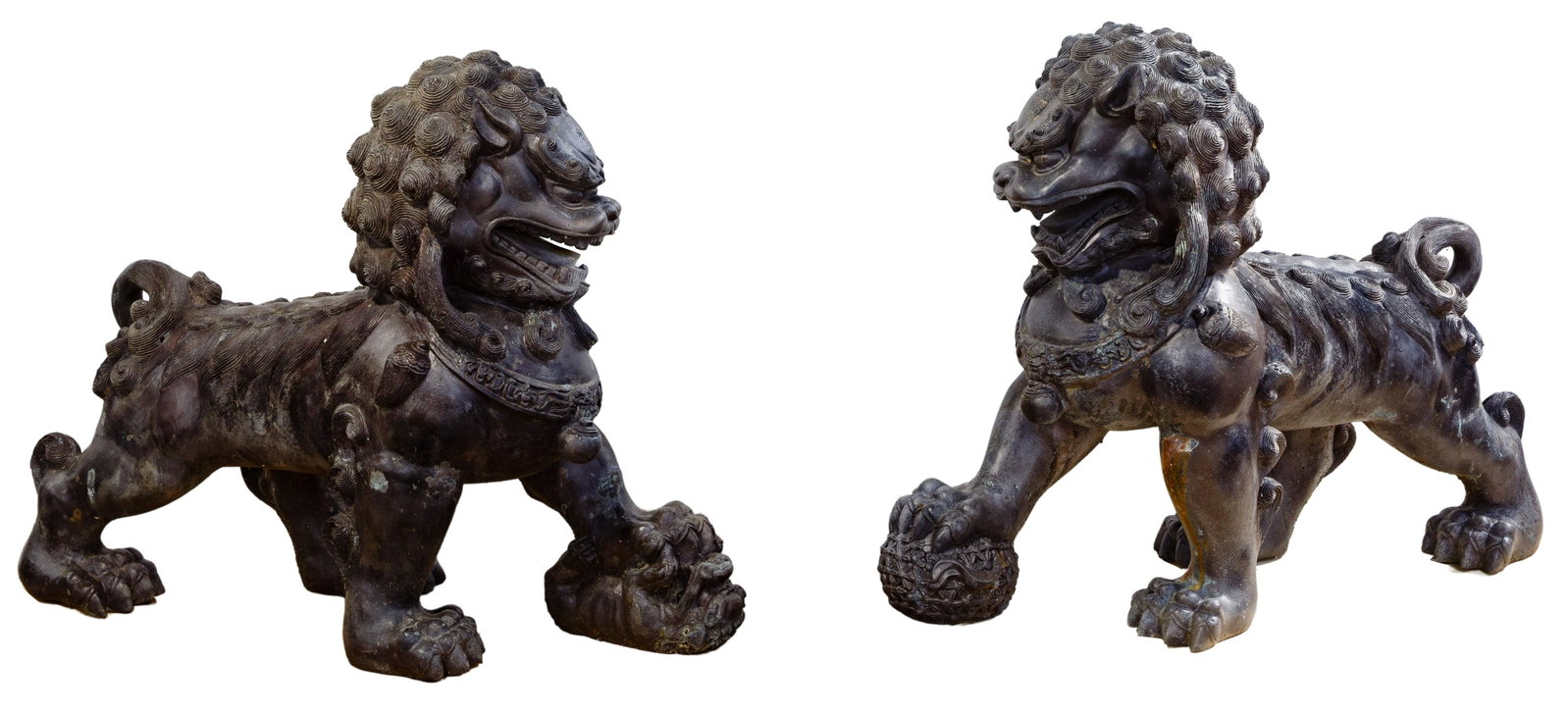 Asian Style Resin Foo Dogs: Asian Style Resin Foo Dogs 20th century, pair of cast resin foo dogs, one having a globe under its paw, the other a puppy; property from a Highland Park, Illinois collector Condition: Very Good, dark 