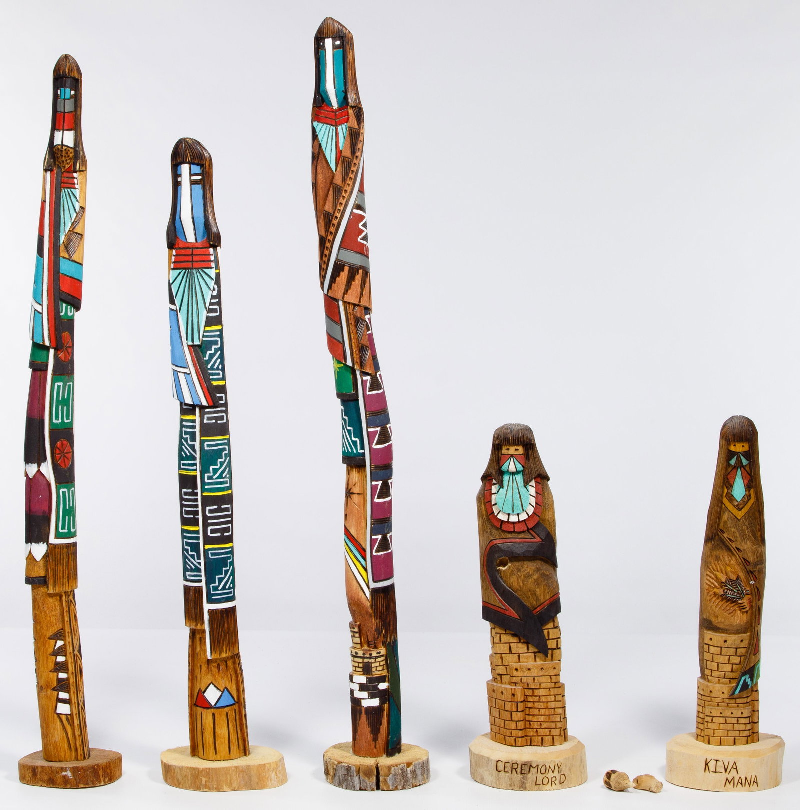 Native American Hopi Kachina Assortment: Native American Hopi Kachina Assortment Five carved and painted cottonwood items including three signed 'Ray Guy' and two signed 'Larry Wally'; property from a Highland Park, Illinois collector Condit