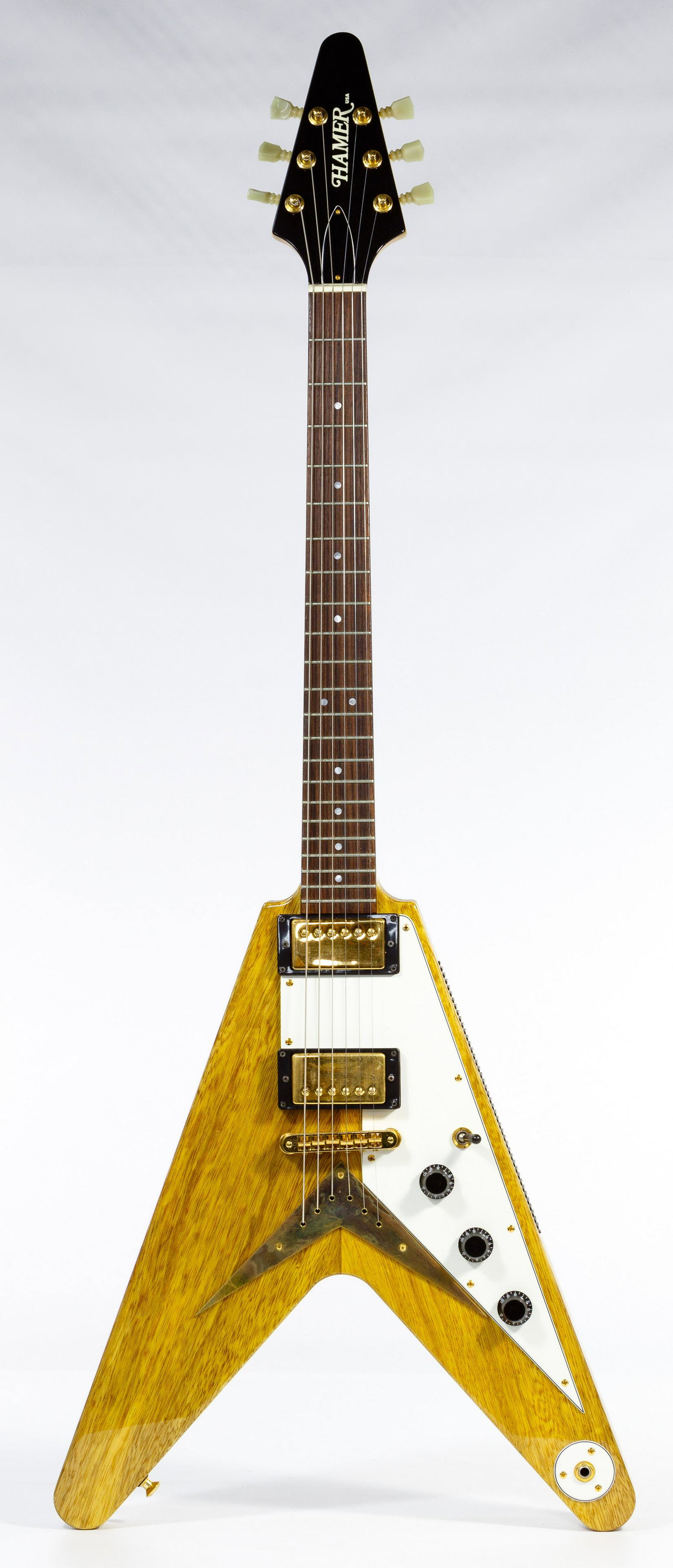 Hamer 1997 Limited Edition Flying V Electric Guitar: Hamer 1997 Limited Edition Flying V Electric Guitar Serial #737780, #004 of 72, having a Korina wood solid body, two Duncan Antiquity Humbuckers, pot toggle with aged switch tip, locking bridge; toget