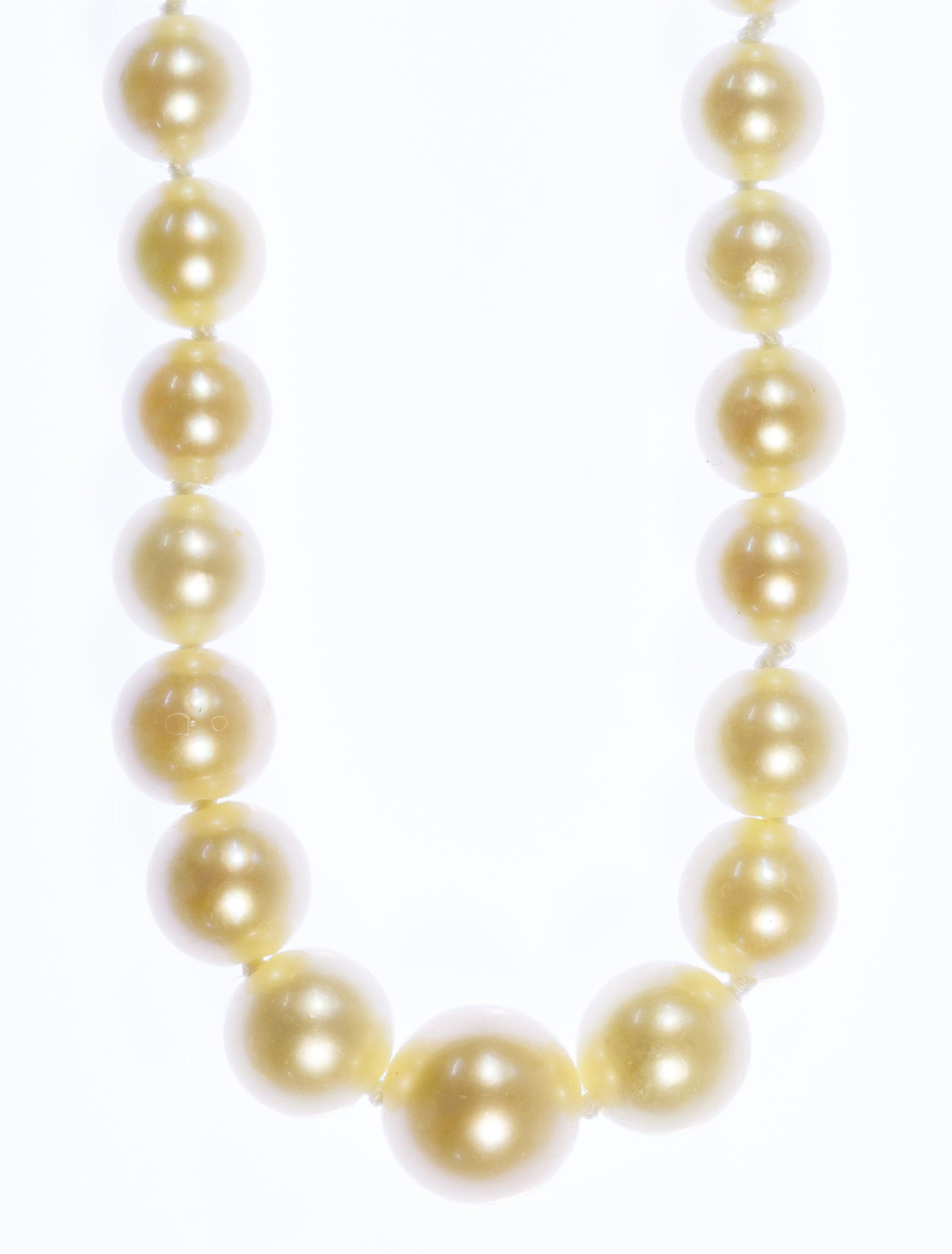 Mikimoto Silver and Graduated Pearl Necklace: Mikimoto Silver and Graduated Pearl Necklace Hand tied graduated pearls ranging from 7.5mm to 3mm; marked 'S' and 'M' inside a shield on back of clasp; with Mikimoto storage box Condition: Good, overa