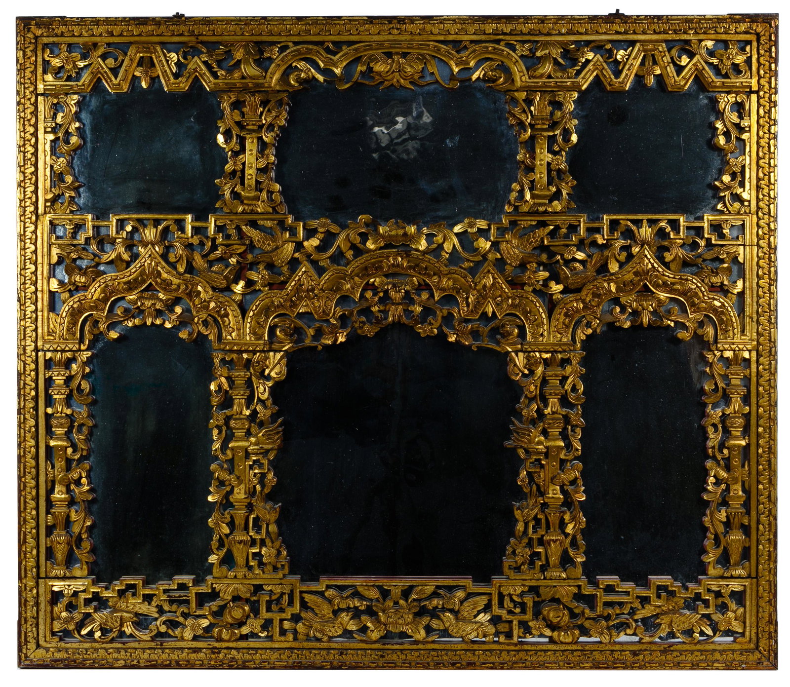 Asian Style Mirror: Asian Style Mirror Rectanglular form, carvings consist of various Asian lattice woodwork, floral work with lotus buds, pillars with various symbols and birds; red interior paint to woodwork, the entir