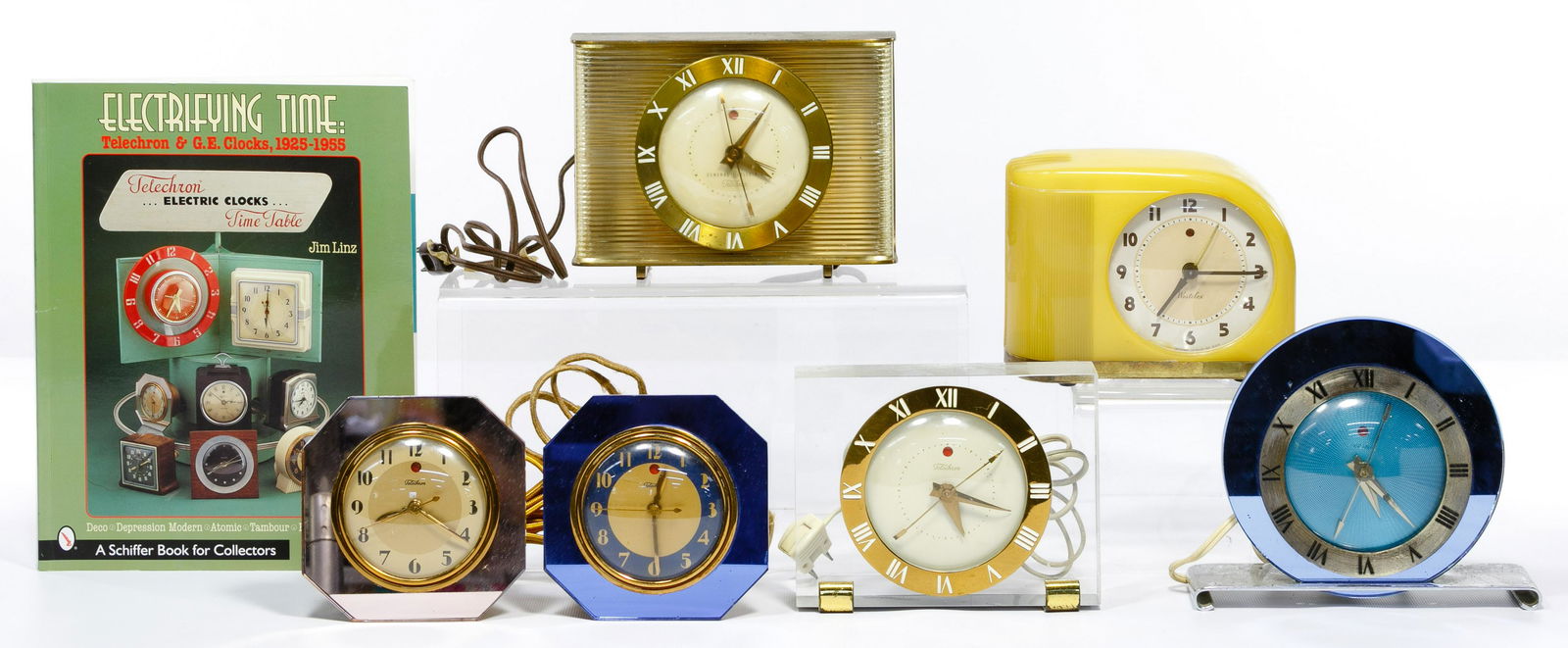 Telechron Clock Assortment: Telechron Clock Assortment Five examples of Telechron electric clocks including a Warren Telechron model #4F65, two Warren Telechron 'Iris' model #3F65, Telechron Inc. model #7H141 and a General Elect