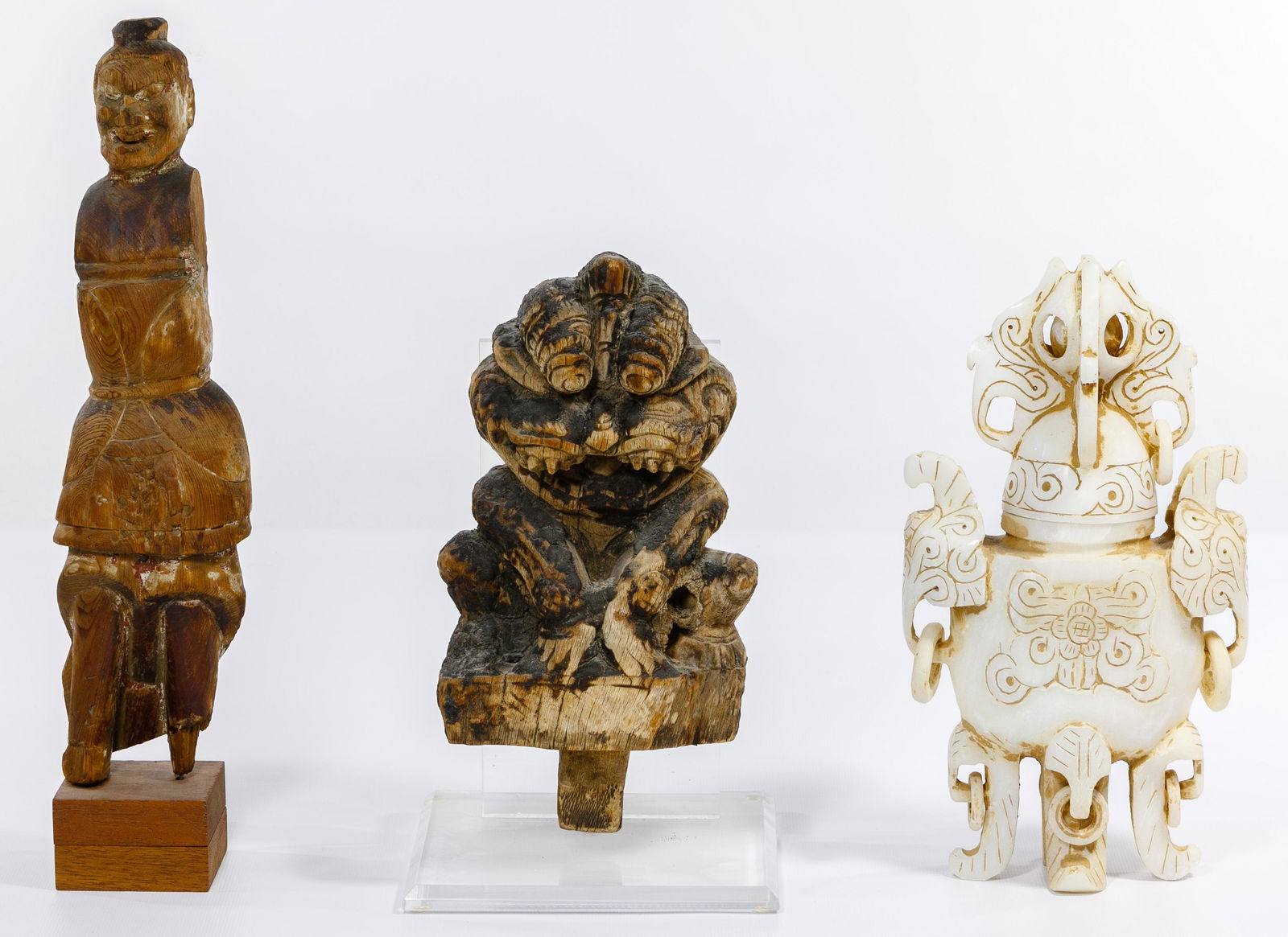 Asian Jadeite Jade Lidded Urn: Asian Jadeite Jade Lidded Urn Archaic style, having engraved linear and floral decoration and rings suspended at legs and from the two mythic beast handles and lid, a freely turning ball carved within