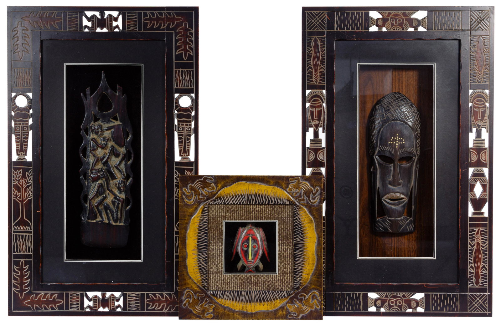 African Style Framed Carving Assortment: African Style Framed Carving Assortment Contemporary wood carvings mounted in shadow boxes having tribal themed carved frames; property from a Highland Park, Illinois collector Condition: Very Good, l