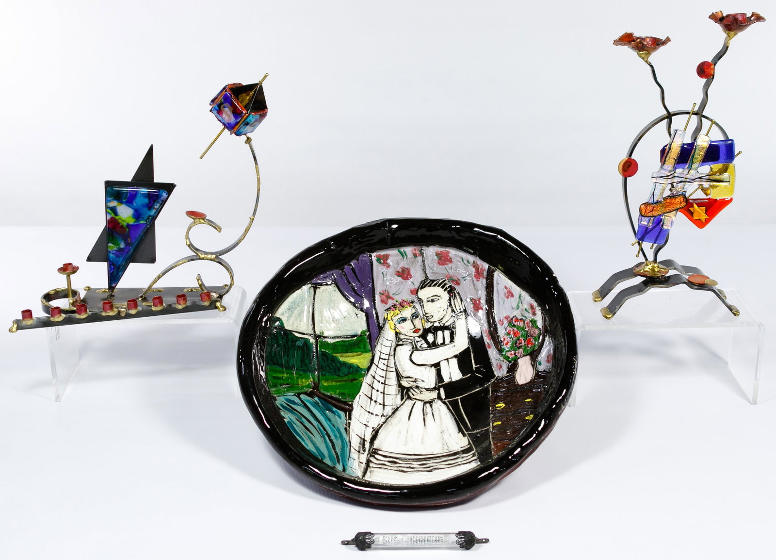 Decorative Judaica Assortment: Decorative Judaica Assortment Two 20th century welded metal, fused glass and cast resin sculptures from the Gary Rosenthal Collection, one being a menorah and dreidel pencil signed and #114/500 en ver
