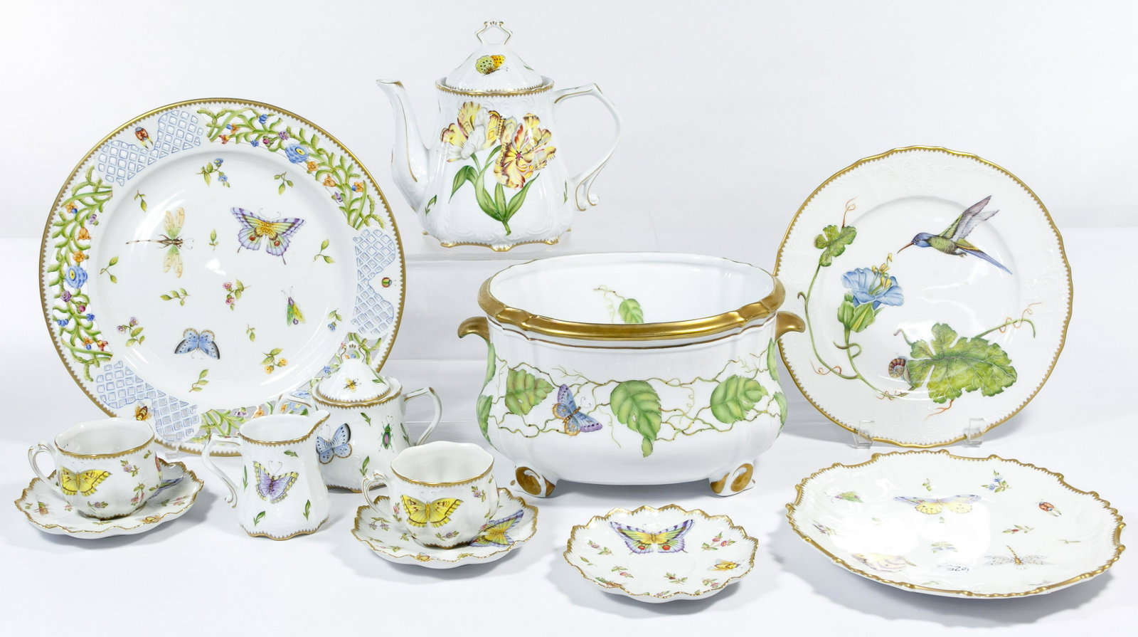 Anna Weatherley Designs 'Budapest Spring' China: Anna Weatherley Designs 'Budapest Spring' China Assortment Twelve hand painted items including in 'Budapest Spring' a creamer and lidded sugar bowl, (3) saucers, (2) cups, a scalloped dinner plate and