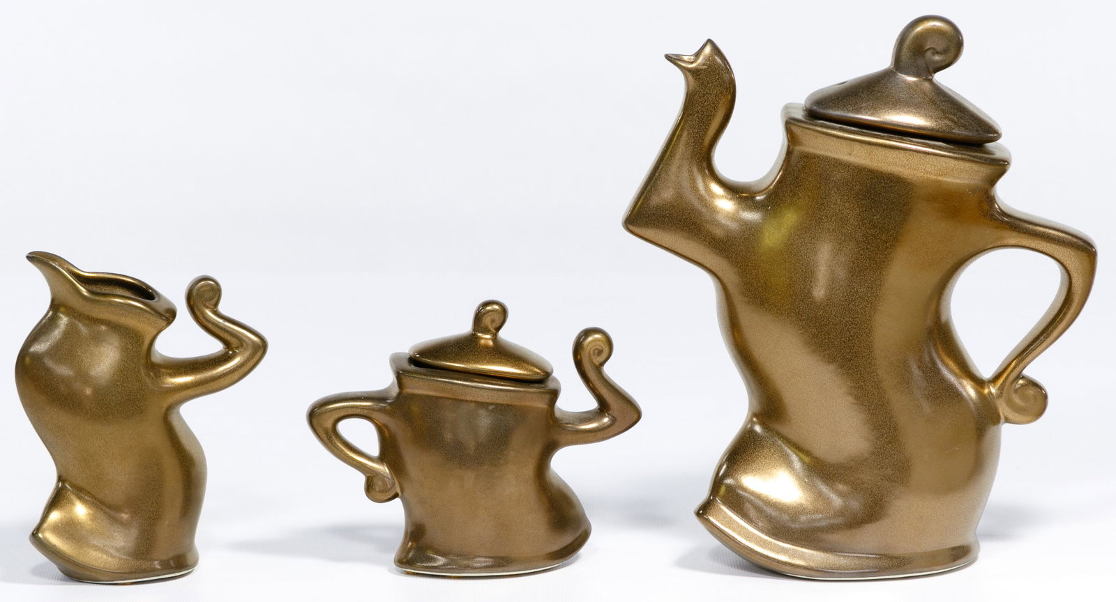 Michael Lambert 'Java Jig / Dancing' Ceramic Coffee Set: Michael Lambert 'Java Jig / Dancing' Ceramic Coffee Set Three items including a lidded coffee pot, a creamer and a lidded sugar bowl having a bronze glaze finish, all signed on under side; property fr