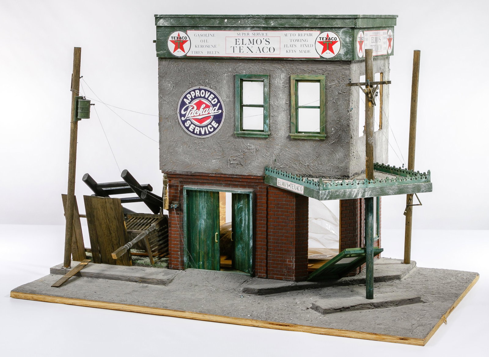 Texaco Station Miniature: Texaco Station Miniature Replica of a station, having advertising, old-time telephone poles and a second level for living; brick and stucco construction; property from a Highland Park, Illinois collec