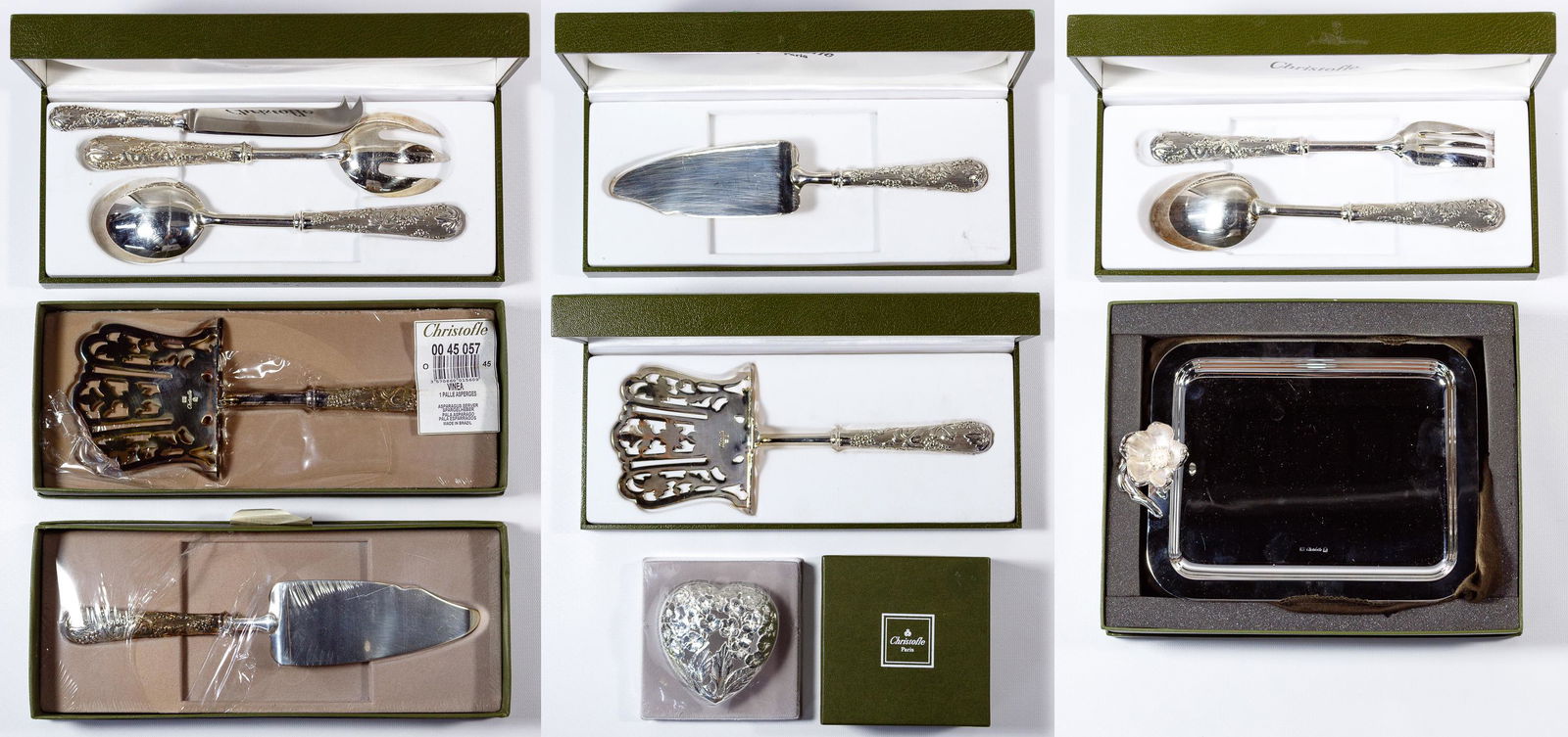 Christofle Silverplate Flatware Assortment: Christofle Silverplate Flatware Assortment Nine items, many in original boxes, including in the 'Vinea' pattern a meat fork and casserole spoon set, salad serving fork and spoon set, cheese knife, (2)