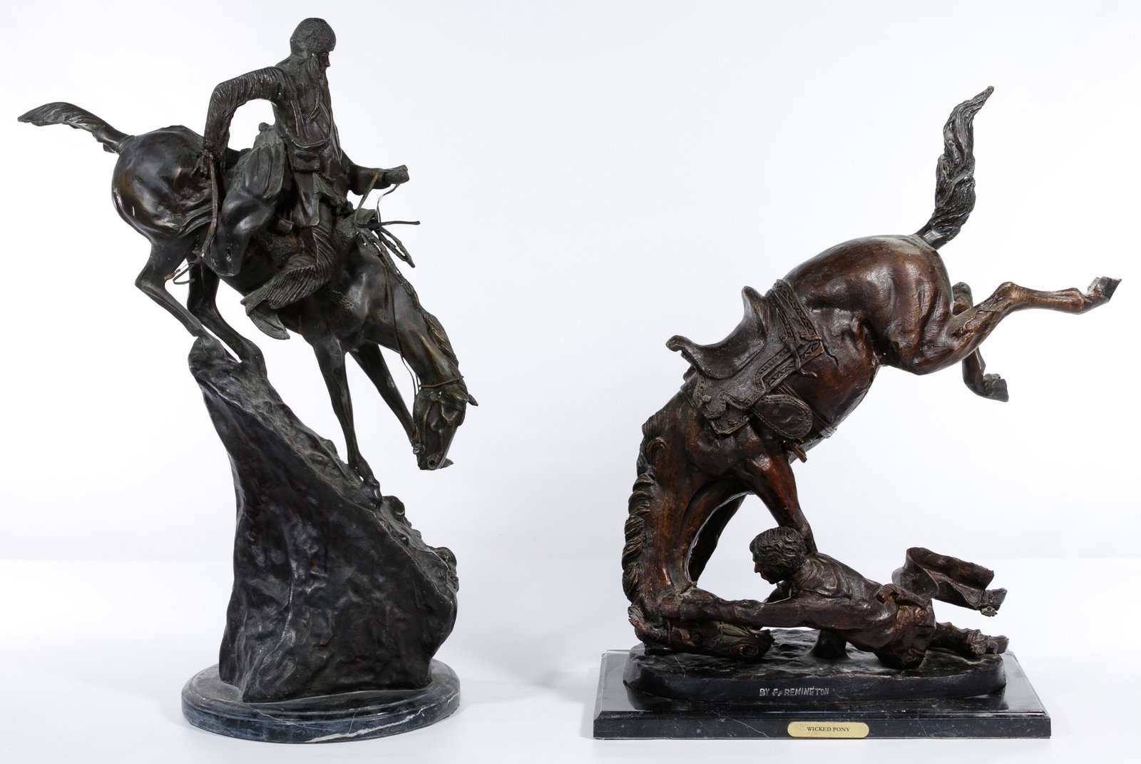 (After) Frederic Remington (American, 1861-1909) Bronze: (After) Frederic Remington (American, 1861-1909) Bronze Statues Two statues including 'Mountain Man', undated, marked 'Copyright by Frederic Remington' on lower side depicting a man on horseback desce