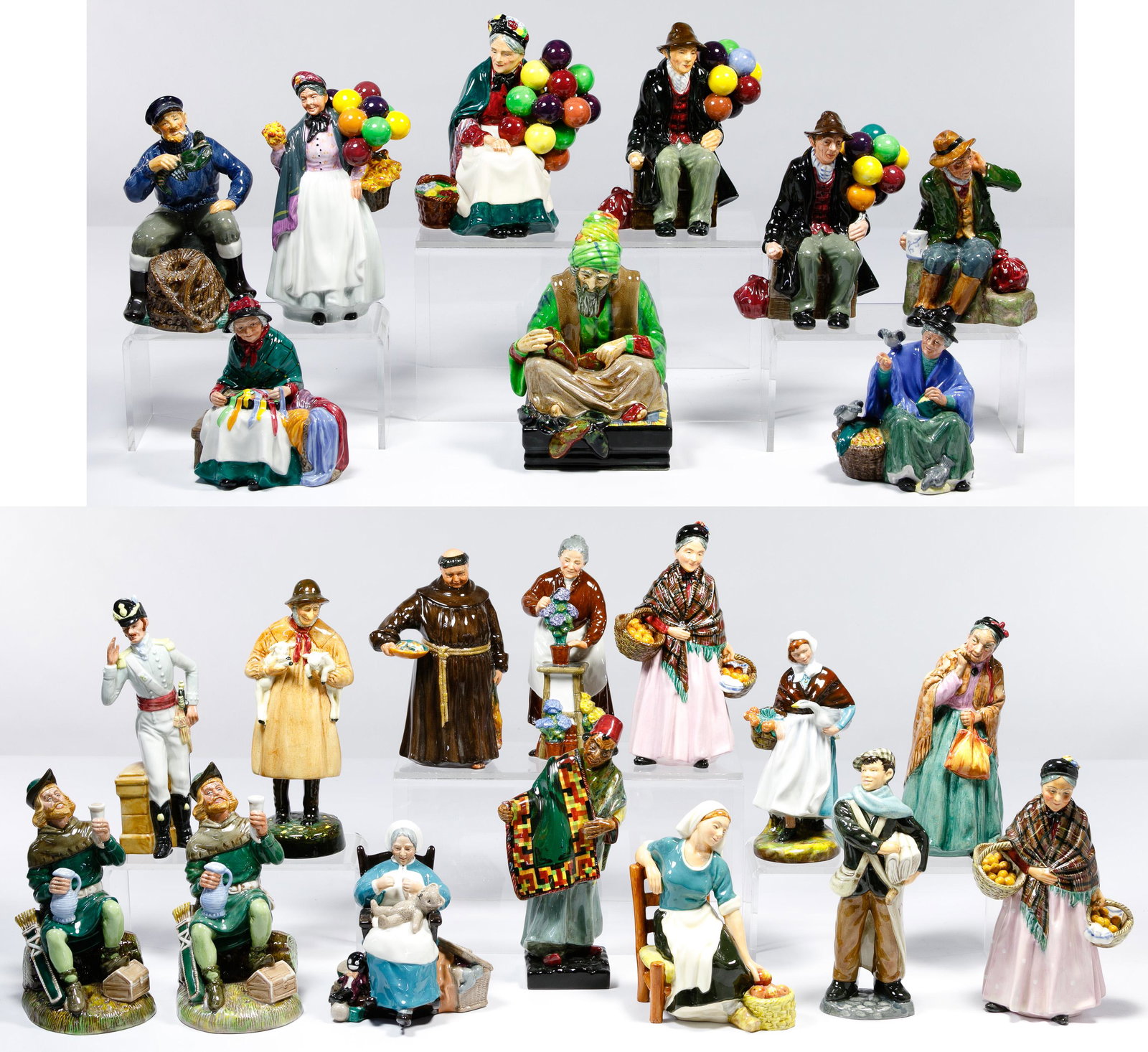 Royal Doulton Figurine Assortment: Royal Doulton Figurine Assortment (23) items including an example of 'Robin Hood' signed by Michael Doulton on underside, 'Robin Hood', (2) 'The Balloon Man', (2) 'The Orange Lady' and 'The Old Balloo