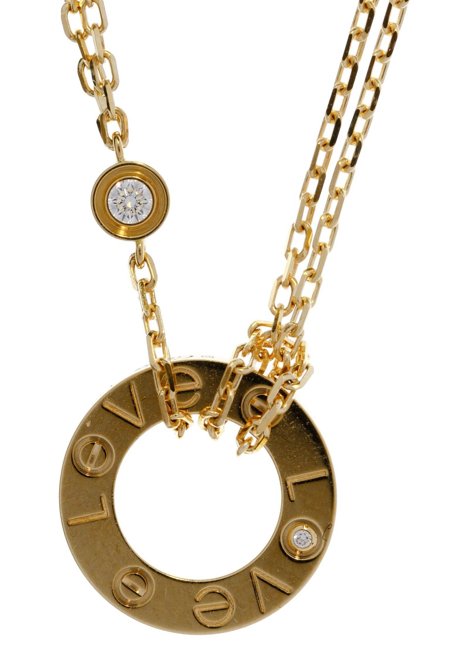 Cartier 18k Yellow Gold and Diamond 'Love' Necklace: Cartier 18k Yellow Gold and Diamond 'Love' Necklace Having an attached 'Love' pendant and set with two small round cut diamonds on double strand necklace; marked 'Cartier', 'Au750', 'ESG963' and '* 1A