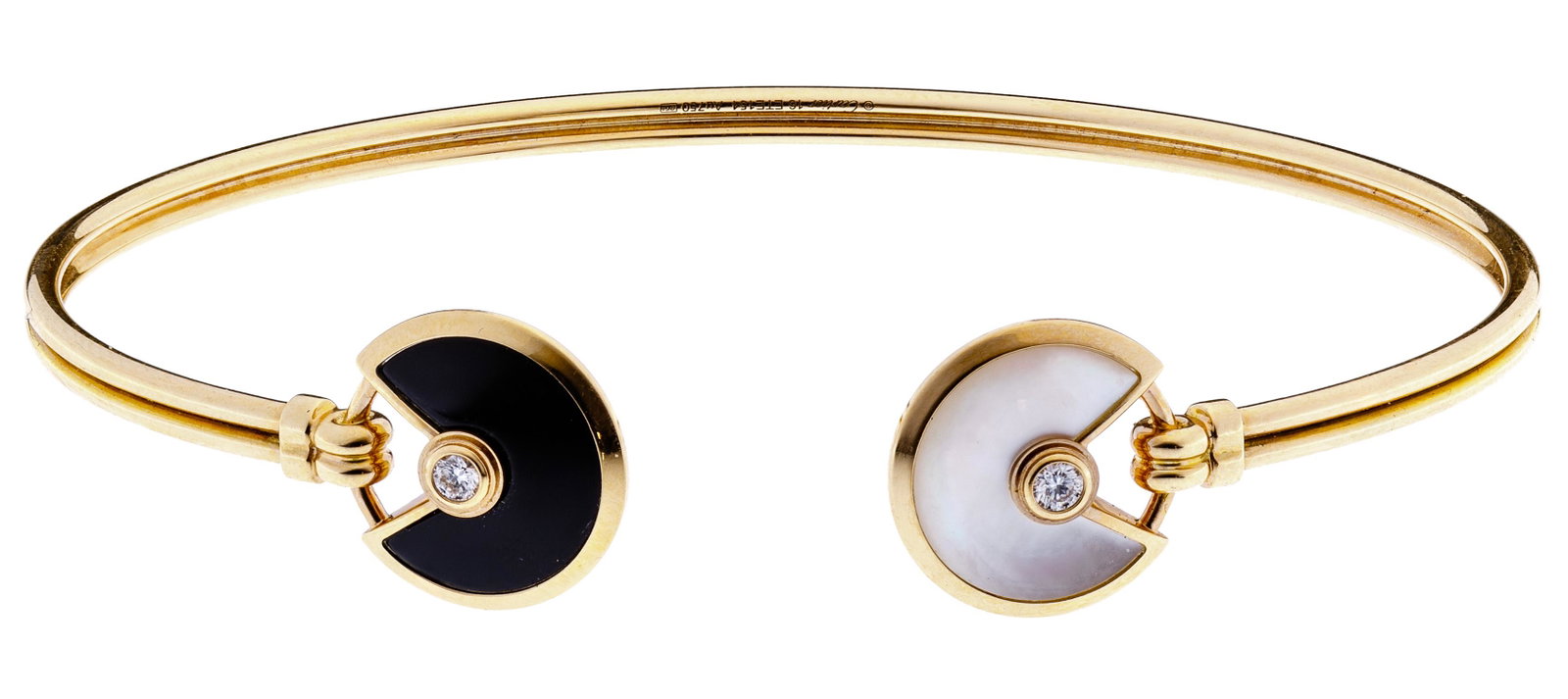 Cartier 18k Pink Gold 'Amulette de Cartier' Cuff Bracel: Cartier 18k Pink Gold 'Amulette de Cartier' Cuff Bracelet Having onyx and white mother-of-pearl, both adorned by round cut diamonds; marked 'Cartier', '16', 'ETE154' and 'Au750'; from an Oak Park, Ill